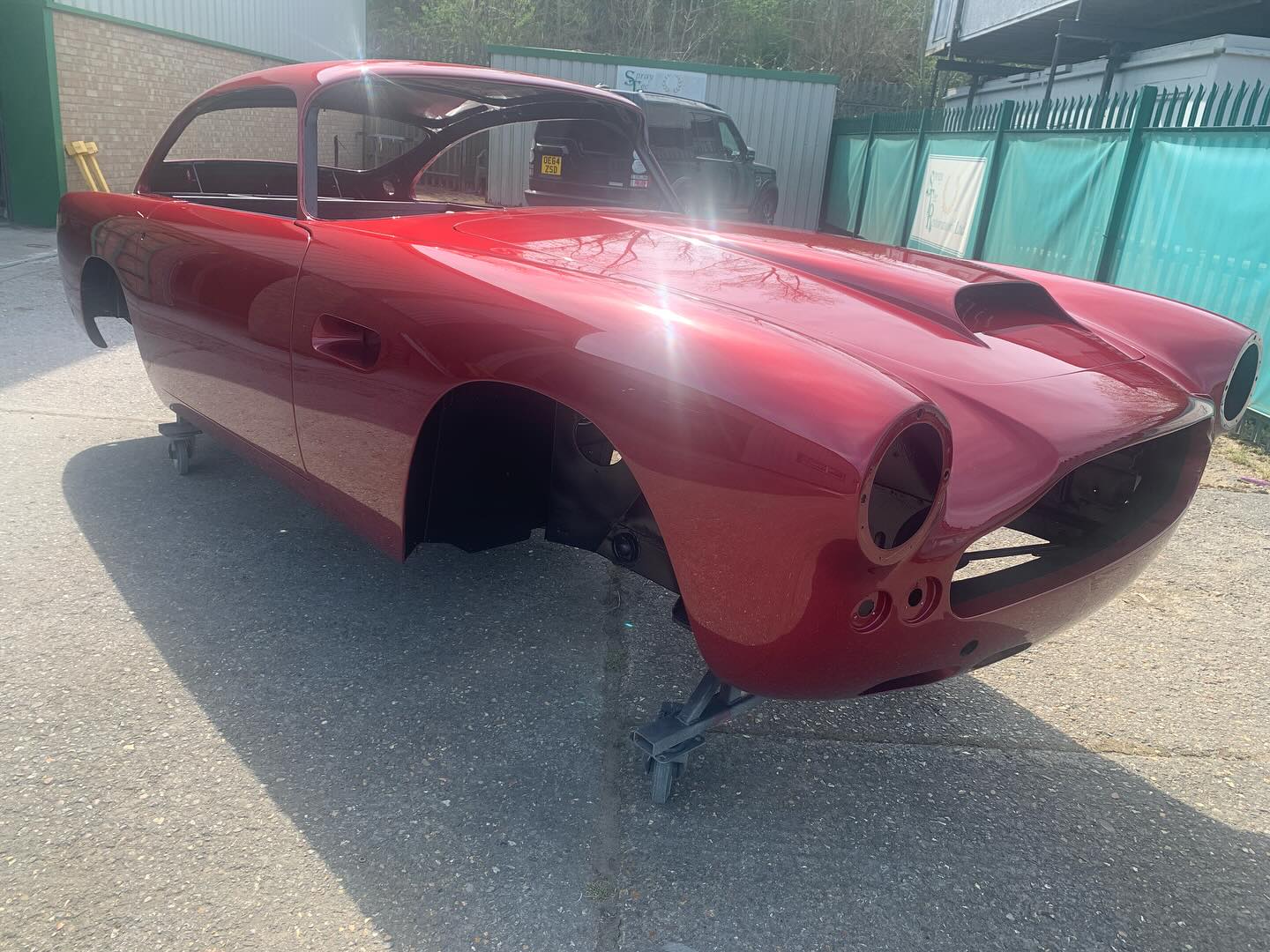 Aston Martin DB4 series 1 painted in its original build colour of Rubino Rosso glistening in the sunshine. Wonderful to be working on projects with the client for over 30 yrs. #AstonMartin #DB4 #classicastonmartin #astonmartinrestoration