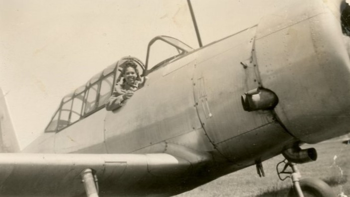 You can meet Columbia Air Center pilot Gladys Otey as a hologram in our upcoming new exhibit this fall! To help us finish the exhibit, please consider coming to our exhibition fundraiser May 3.
Gladys was one of quite a few women who flew at the Columbia Air Center. She became interested in flying after she saw a CAC “Learn to Fly” ad while riding in a streetcar one day. She flew out of the Columbia Air Center for about 5 years—John Greene called her D.C’s Willa Brown. Here, she sits on the wing of a Vultee BT-13 at Columbia Air Center.
For more info and tickets to our special fundraising event, visit: https://www.fieldoffirsts.com/cac-fundraising