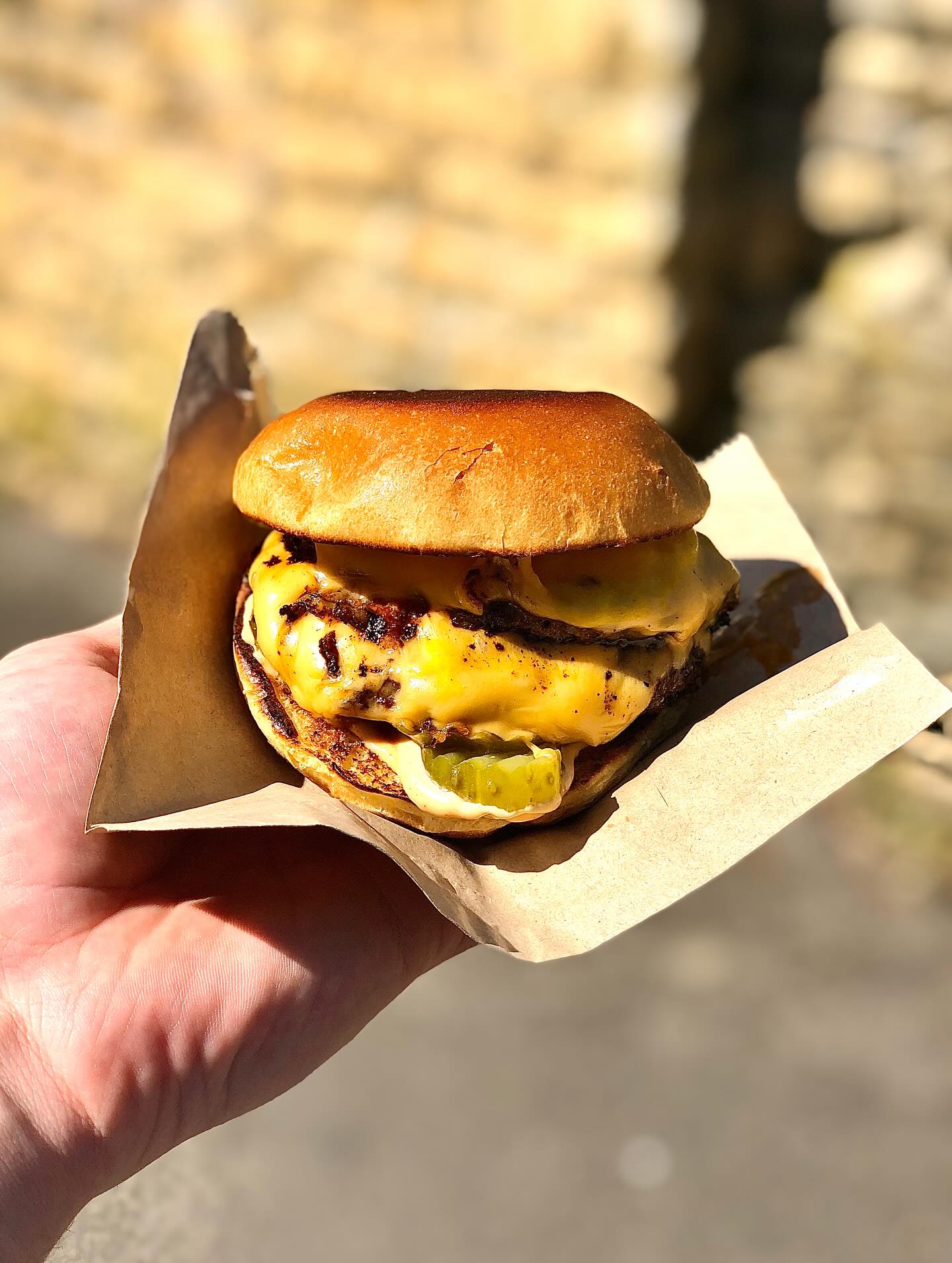 THEN VS NOW
Two lads slinging burgers outside the front of their newly acquired restaurant without a clue and without jobs! The first photo is one of the first burgers we ever sent out back in 2020. (Which we were so proud of by the way and I think it cost the bloke £6 😂)
Fast forward 5 years and we’ve had some special moments and some extremely tough moments, all of which have taught us a lot. One thing has remained the same though and that is we are still seriously ‘passionate about patties’!