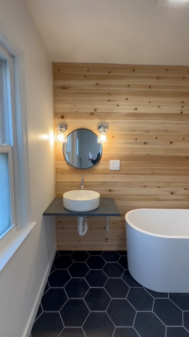 Another bathroom remodel done—out with the old, in with the sleek, modern vibe!