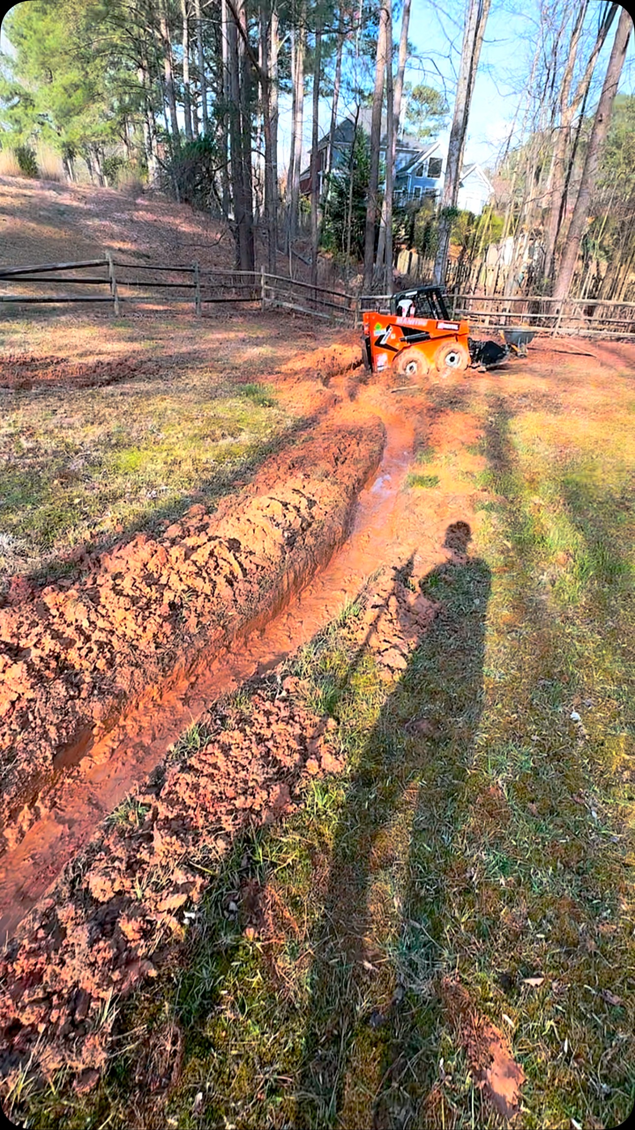 One of those days where you work so hard, you unlock a new level. Got that machine stuck, then unstuck kinda, then super duper stuck. I thought if I stayed away from the squishy part and made a gravel path, I could get away without using a track steer. I was very wrong. I decided to just start digging to get this swamp to start draining. I dug 100ft trench in the mud, 10” deep, 14” wide, by myself, with a shovel… in one day. Worked like a charm too.
#atlantadrainageprofessionals #atldrainpros #atlanta #frenchdraininstalleratlanta #atlantadrainagecompanies #atlantadrainage #drainagecompaniesnearme