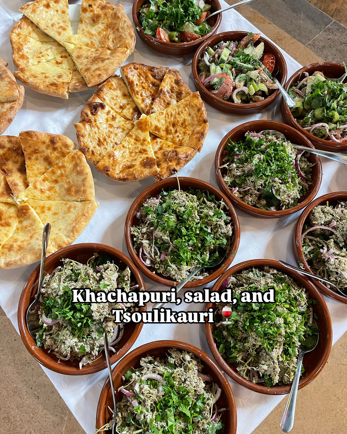 Khachapuri and salad spread our guests enjoyed before their khachapuri masterclass!