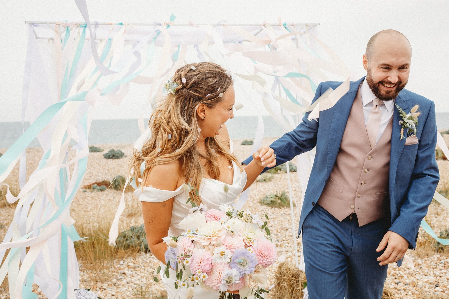 Real Wedding ❤️
@keshiracreativeevents first met L&C at the family home and heard all about their hopes and dreams for a beach wedding in their garden. It looked to be a logistical challenge!
They were so relaxed, fully trusting & up for everything so she knew exactly what suppliers would suit their day, starting with the obvious, Vicky @spotonceremonies was exactly what they needed to personalise their ceremony.
Next was the incredible @annies_foodinspiration who created utter deliciousness out of a small room in their house - she even did soft serve ice cream 🍦
The marquee was built by the team @lewismarquees who had to squeeze a big enough tent for 120 into a small and rather windy beachside garden.
The incredible mass of pastel mix flowers were designed by @flowers_x_foliage and filled every space you could see.
The best part of the day? Watching the wedding party enjoying a game of beach cricket at sunset 🏏🌅
The logistics are always made easier by working with top notch suppliers, focussed on your vision and ensuring you have someone to oversee and project manage.
We love to share real wedding examples when we chat so you get real life questions answered!
#weddingpodcast #wildlywedpod #weddingplanner #weddingcelebrant #diywedding