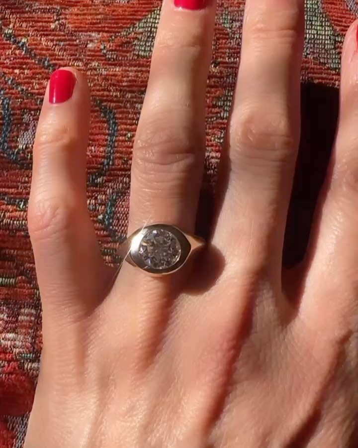 I often find myself taking photos of the entirety of a scene, a desire rooted in remembering the complete context of a moment. The thought is that, in looking back, I can fully recall that specific time and place - all the feels. ✨ Yet, recently I feel like the true magic of a photo is in the details - cropped in close - an exchange, light upon a loved one’s face or a the sun on a piece that I’ve made - these parts hold the meaning of that moment. Our memories, I feel like often surface not as films, but as poignant flashes of feeling or the echo of words and phrases.These shared memories and moments are what may truly compose the narrative of our lives. We string together these close-up glimpses and snippets of conversation, crafting the chapters of our stories, complete with their ups and downs, the brilliant and the mundane moments. Each chapter of our book illustrated with its ups and downs that inform our likes, dislikes and ability to make predictions for how we want to continue to write it.
These thoughts are part of what I get to do with my work as I work with someone to create a token of significance for a bigger snapshot of their life with another. This very process of making a piece specifically for their loved one adds to this story and the significance. Making an object come to life for one specific person is really just an act of love.<3 It’s the time and intention built into this lasting object that will ride along as a collector of all the moments of a life together. This silent collector of the meaning held within countless shared exchanges or cropped in moments. He brought a very cool ring from a beautiful family member that we collected the stunner of a diamond from. Together we settled upon a sculptural and classic hand carved design with the diamond sunk in the gold, ready to roll for a lifetime of adventure together. Biggest congrats to these beautiful people - it’s always a real honor to witness the love and happiness of this moment in time for two beautiful humans.❤️✨ #customjewelry#madeinnyc#katherinelincoln#lovestory#nyc#customengagementring#sculpturaljewelry