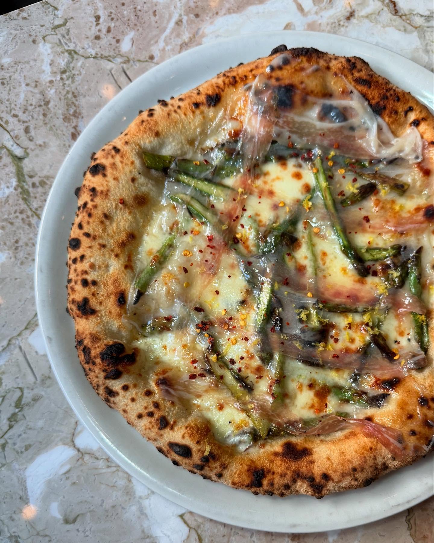 New Pizza on Notoâs Spring Menu
Asparago
olive oil | fresh mozzarella | asparagus | lardo | Calabrian chili | lemon zest