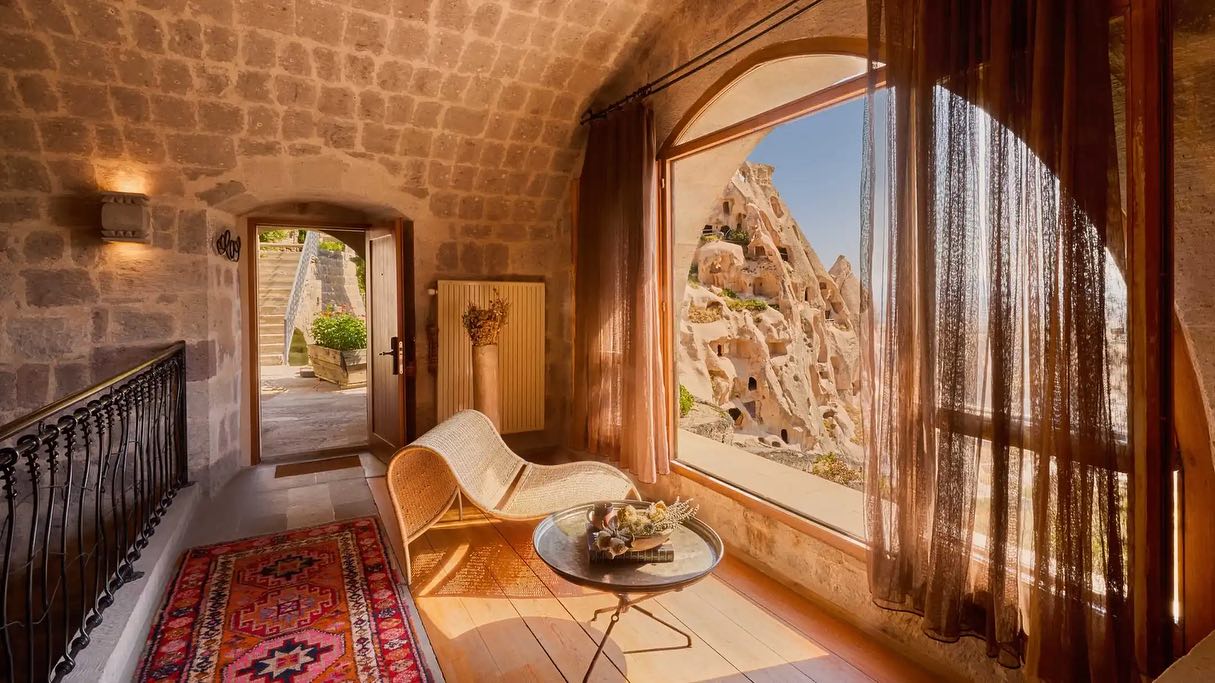 Discover the mystical allure of Argos in Cappadocia, Turkey. Nestled in the carved plateaus of Uçhisar, this unique hotel blends ancient history with modern elegance. From cozy cave suites complete with fireplaces and a private pool, to stunning views of Pigeon Valley and Mount Erciyes, every moment is unforgettable. Savor Anatolian cuisine, sip local wines, take a moonlit walk and soar above fairy chimneys on a hot air balloon ride at sunrise. Argos honors the land and indigenous culture through sustainable practices and deep-rooted respect for Cappadocia’s heritage. Perfect for romantic getaways and bucket-list adventures.
Book your stay with us for exclusive perks and a seamless experience. Let’s craft your dream Cappadocia journey. #ArgosInCappadocia #Cappadocia #TurkeyTravel #LuxuryTravel #BucketList