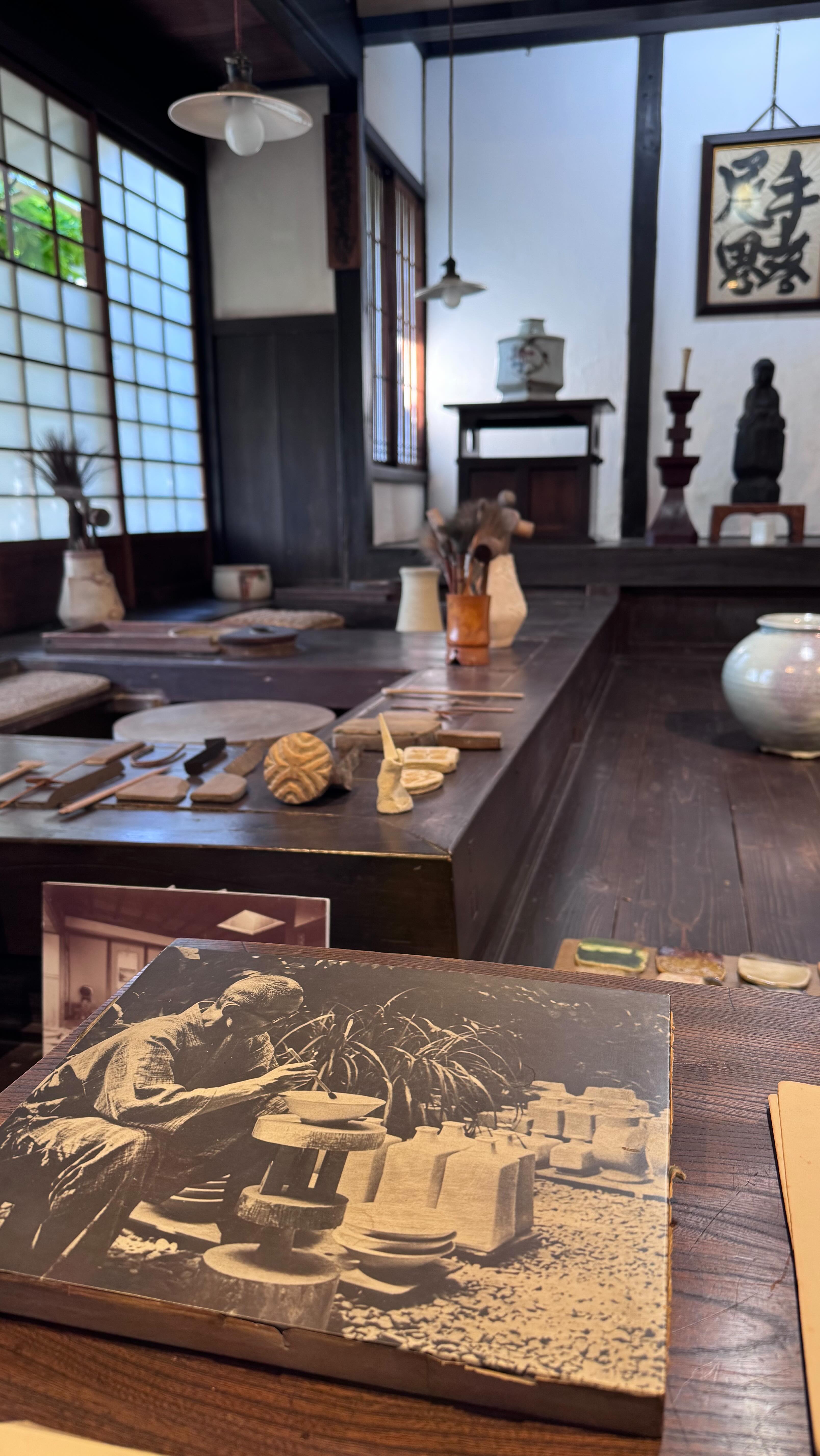 Went to Kawai Kanjiro’s house today which was a delight…
Here’s the leaflet wording..
Kawai Kanjiro, with the intuition of a poet and the analytic mind of a scientist, is generally considered to be a potter of the leader of folk art movement without peers, a genuine writer and a wood sculptor in his own right.
Throughout his life, he retained that abounding freshness found in curious children, he found interest in all surrounding him and released his creative energy through his art regardless of public criticism or approval. There were no boundaries to his interests. He opened himself to various natural objects, experimented endlessly with techniques and worked industriously to meet his inner urge for creation. But as with every artist, he was himself his most critical and severest judge, often leading to self-dissatisfaction and destruction of prior works.
There are roughly three stages in his developing style.
Initially his work showed a great influence of Chinese and Korean Ceramics. His second period however was affected more by the severity of folk art with his own innovations in boldness, simplicity and practicality. This was largely due to his admiration of provincial folk art, which was then thought to be crude in shape and form. In the final stage he developed still another novel style in pottery.
This third stage is called the “world of indeterminate forms.” In his later years, he began to recognize human expressions in all surrounding him, whether inanimate or animate, and these images he carved into wooden forms. Continued in comments…
#kawaikanjiroshouse #japanesepottery #kyoto