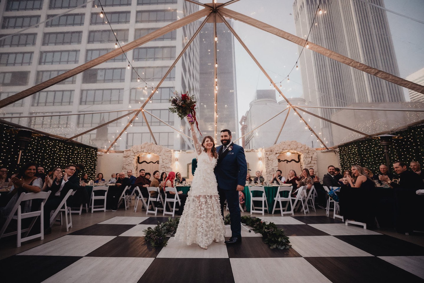 Who needs an aisle? Mirielles and Nicholas stood in the middle of the dance floor and said their vows surrounded by the people who matter most. It wasn’t formal, it wasn’t traditional — it was just them, exactly how they wanted it. 💍🌇
Photo: @Lulanphoto
#TheOviatt #DTLAwedding #RooftopVows #DoItYourWay #ModernLove