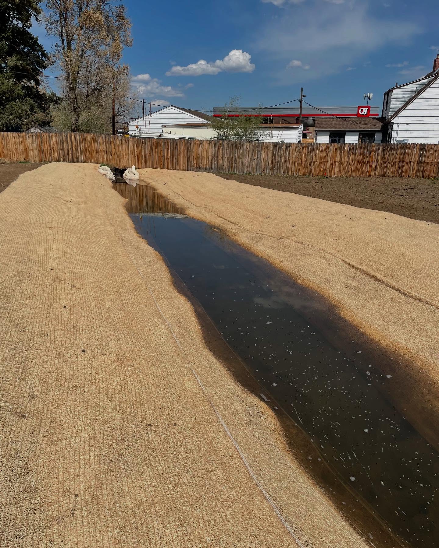This winter someone backed their car into our ditch and it collapsed. Originally, the sides of the ditch were wooden railroad ties stacked upward. Well, the car causes it to all collapse. Thankfully, last week the ditch rider (guy who operates the ditch on a daily basis) was able to get it fixed last week. They removed the railroad ties, and regraded the sides of the ditch into a gradual slope. Now we can run water thought it! Yay!
