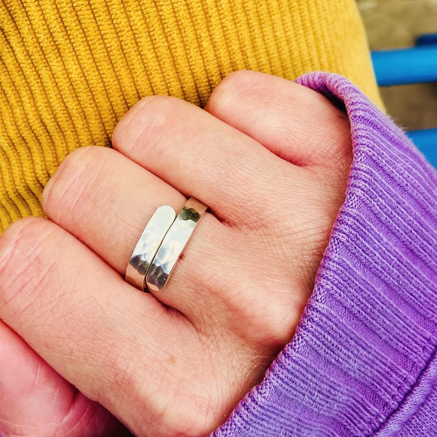 Here is a lovely Sterling Silver wrap ring, with a hammered finish - to catch the light!
This is an adjustable ring. We make it to a pretty average size (Q/8), and then it can stretch open or closed a few sizes either way to ensure a good fit.
This makes the ring perfect to send as a gift as you don’t need their ring size 💕