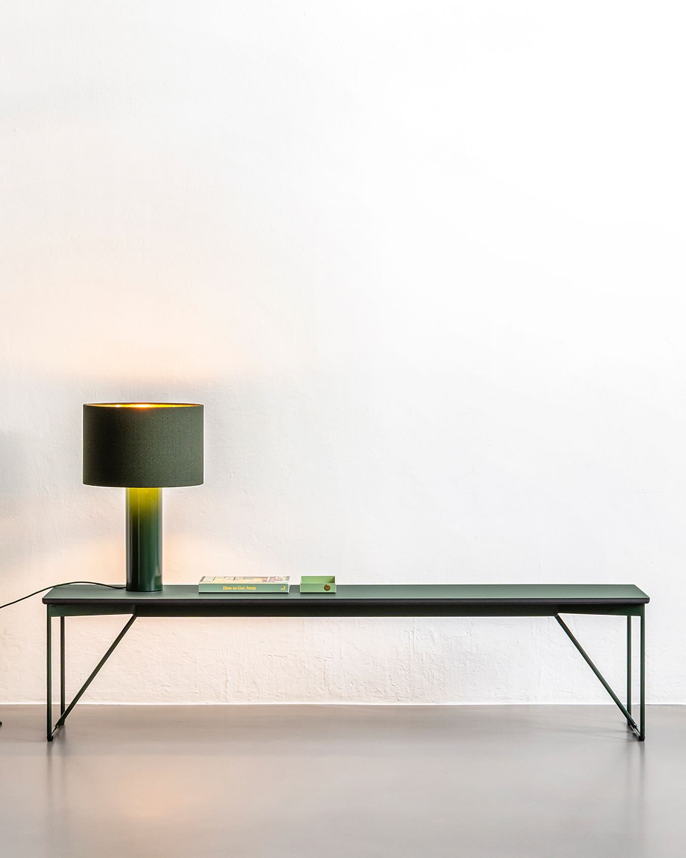 NEW SAME SAME BENCH + ALL ROUND MIDI LAMP
Same same but different. This bench is solid as a rock. The delicate-looking frame is handcrafted from round steel, bent into shape and made from two identical, mirrored parts. The steel is powder-coated for a clean, durable finish. The seat is made from linoleum mounted on 2 cm thick, through-dyed MDF with softly rounded edges. Designed and made in Germany.