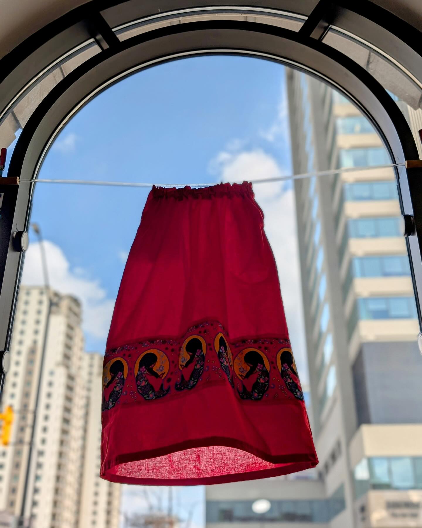 May 5, 2025 marks the 15th anniversary of the National Day of Awareness for Missing and Murdered Indigenous Women, Girls, and 2SLGBTQIA+ Peoples. This day, also known as Red Dress Day, can be traced back to a powerful installation art project by Canadian Métis artist Jaime Black. The installation was “an aesthetic response to a critical national issue.” Black described her hopes for the installation which first took place in 2010, “Through the installation I hope to draw attention to the gendered and racialized nature of violent crimes against Aboriginal women and to evoke a presence through the marking of absence.”
In an effort to carry on Black’s message, amplify Indigenous voices, and bring awareness to our local community, the London Arts Council (LAC) in partnership with the @cityoflondonont Culture Services have installed red skirts created by Indigenous artist and educator, Kathleen Doxtator @kathleen_dox23 from Oneida Nation of the Thames, in the windows of the J. Allyn Taylor building.
The red skirts are displayed to acknowledge the many missing and murdered Indigenous women, girls, and 2SLGBTQQIA+ peoples across Turtle Island, and the ongoing calls for support.
There are great resources provided by other organizations. To learn more about MMIWG2S+ and participate in local events in commemoration of the day, please visit our link in bio.
Photos of “Red Dress Project – Two Red Skirts” by Kathleen Doxtator
#MMIWG2S+
@canadalifeco @cityoflondonont @ontarioartscouncil