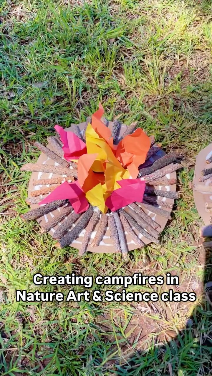 To create these at home just gather sticks, construction paper and glue! Crumple paper strips to make 🔥 #kidsartproject #elementaryartclass #eastvalleymoms