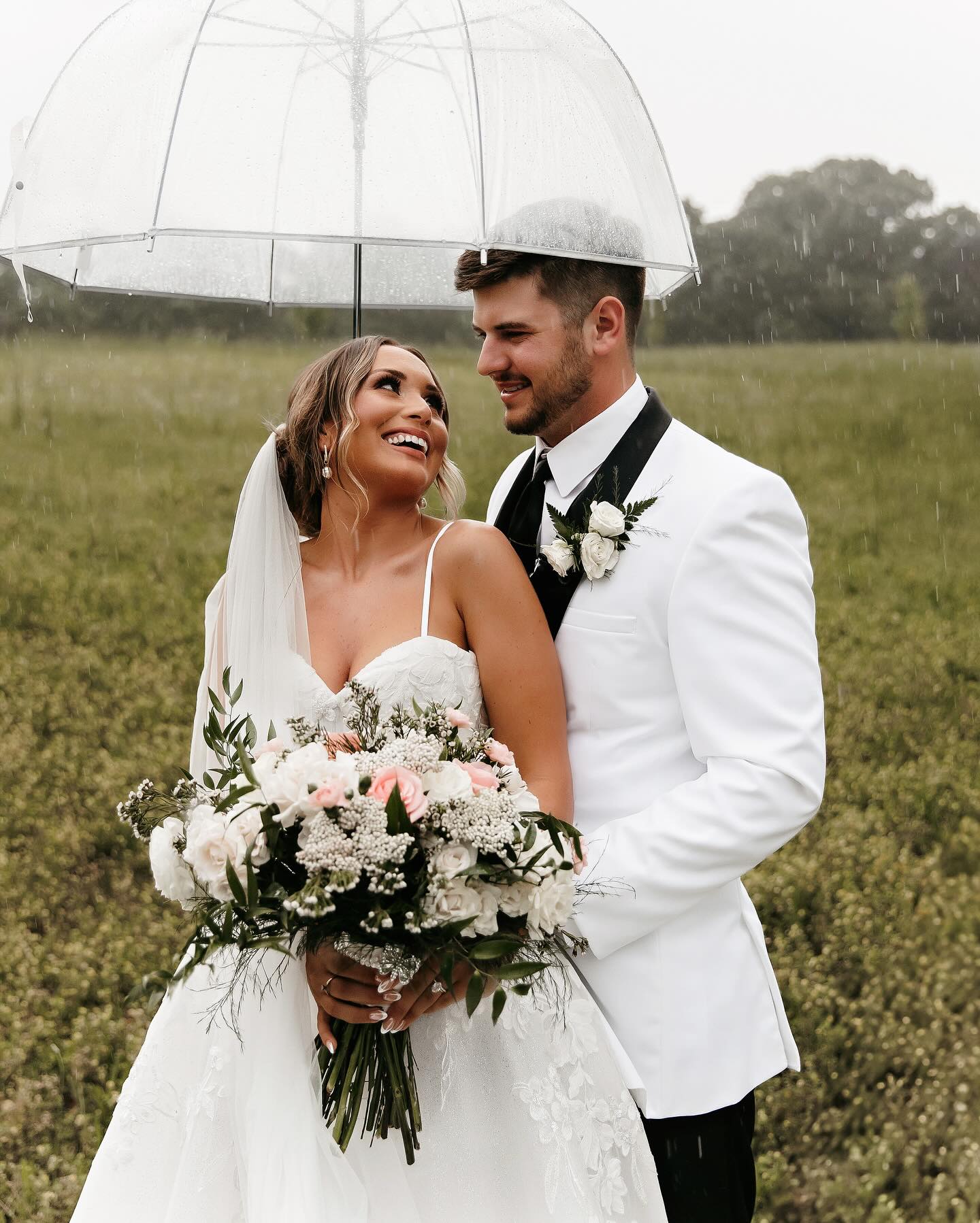 M a g g i e + G r a e s o n
5. 3. 25 | M u s e F a r m s, G e o r g i a
Raindrops kissed the air as Mr. & Mrs. Hunter embraced as husband and wife for the first time. Best friends, soul mates, forever. Oh how sweet it is to witness a love like this!! A little rain didn’t phase them as our lead photog, Mary Catherine, soaked up every second of its beauty!! Our team at ACP is forever thankful for these moments and can’t WAIT to share more!! #ashlyncatheyphotography // Shot by Mary Catherine