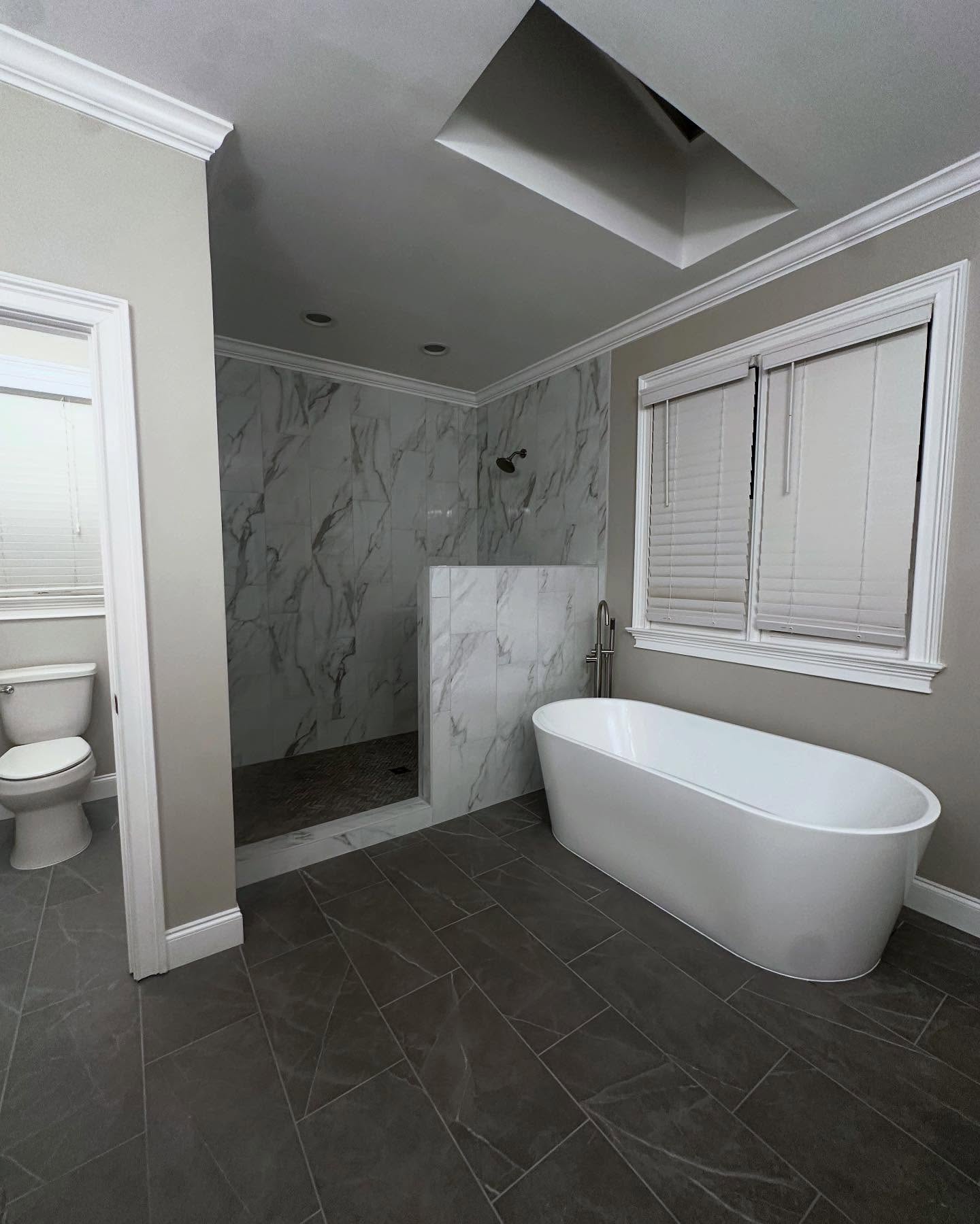 We are still swooning over this full master bath remodel. Specializing in custom tile design & installation. Explore our latest bathroom remodel—where craftsmanship meets elegance. We could not be happier with how this turned out!
Swipe to see the step by step process of this one!! 🛁
tile: @mosaictile
cabinet paint: @sherwinwilliams
tub: @homedepot
#hillmanhomes #hillmanhomesnc #customtile #customtileshower #tileinstaller #schlutersystems #schluterkerdi #schlutersystemsna #nctileremodeling #wakeforestconstruction #raleighconstruction #creedmoornc #bathroomremodel #bathroominspo