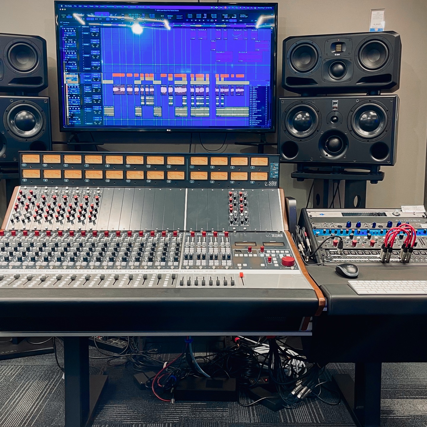 Big News from L&M Studio:
Our New @rupert_neve 5088 Station Is Live!
As the saying goes, "Good things come to those who wait." Well, the wait is over—and we couldn't be more excited to share the latest chapter in our showroom's evolution.
-A Console Worth the Wait
We're thrilled to announce the arrival of our custom @argosyconsole Eclipse furniture, now home to our Rupert Neve Designs 5088 console. This sleek, ergonomic setup not only elevates our workflow but also brings a fresh sense of openness to the space.
-Outboard Gear That Delivers
Our outboard rack is now fully equipped with:
• Mäag Audio EQ4M – Renowned for its silky smooth EQ curves
• Rupert Neve Designs Master Bus Processor – Adds depth and clarity to the mix
• Manley Labs TNT Mic Pre – Offers versatility with both "Tube" and "Cool" (solid state) channels
• Universal Audio X16 Gen2 Interface – Ensures seamless integration and pristine audio quality
All connections are routed through:
• Neutrik 1/4" patch bay – For reliable and flexible routing
• ART Pro Audio XLR patch bay – Simplifies signal management
-Monitoring That Speaks Volumes
Our monitoring setup includes:
• ATC SCM45 – Known for its accurate and transparent sound
• Adam Audio S3H – Provides a detailed and dynamic listening experience
-Almost There
While the core setup is complete, we're putting the finishing touches in place:
• Bass traps on either side
• Strategic acoustic treatment
• Wall-mounting the monitor
And yes, the main mix out from the 5088 is patched back into the X16, allowing you to print stems or a quick reference mix through the console. It's a workflow enhancement we're particularly excited about.
-Visit Us at 935 Bloor St West
While we're still adding some aesthetic elements like signage and a few showroom touches, the space is already buzzing with creative energy, and, our four upper ATMOS speakers for our S4 immersive station are on their way!
Looking forward to seeing you soon!
• The L&M Studio Team
@maagaudio @uaudio @neutrikamericas @manleylabs @art_proaudio @longandmcquade @ysl_pro
