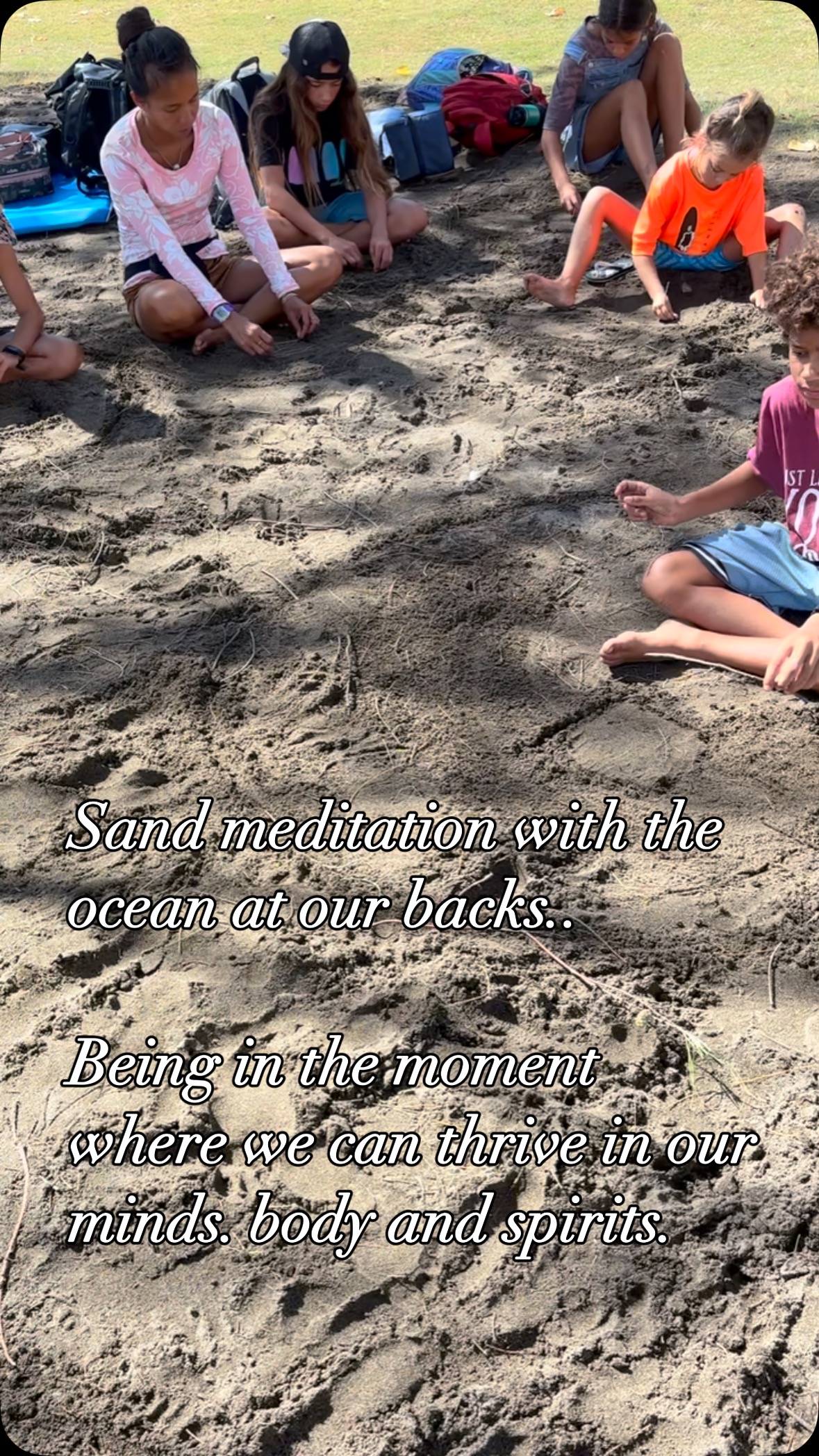 Only sound needs are the ocean waves and the music of the birds..
The Benefits of Sand Meditation: Creating Calm Through Creativity
When we sit quietly in the sand and use our hands to create—drawing patterns, making shapes, or building small sculptures—we enter a gentle state of focus and calm. This practice, known as sand meditation, offers more than just a peaceful moment outdoors:
Grounding Energy – Sitting in the earth and touching natural elements helps us reconnect with our bodies and surroundings. It calms the nervous system and brings us fully into the present moment.
Sensory Integration – The texture of sand provides sensory feedback that’s especially helpful for young children. It stimulates touch in a soothing and safe way.
Creative Expression – Making art in the sand invites imagination without pressure. There’s no need for perfection, just play and process.
Letting Go – Sand art is temporary by nature, and this teaches a powerful lesson: beauty doesn’t have to last forever to matter. We learn to enjoy the moment without clinging to the outcome.
Emotional Release – Like journaling with your hands, creating in the sand can be a quiet way to express feelings that are hard to put into words.
In a world that often moves too fast, this simple practice of sitting in stillness, using the earth as our canvas, teaches presence, peace, and the art of slowing down.
What are the possibilities of these keiki becoming leaders when they value a moment in time??