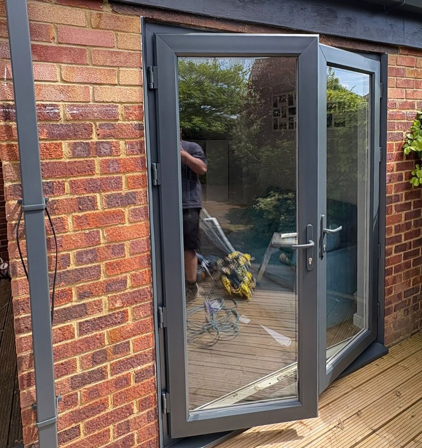 French doors and guttering sprayed in Anthracite