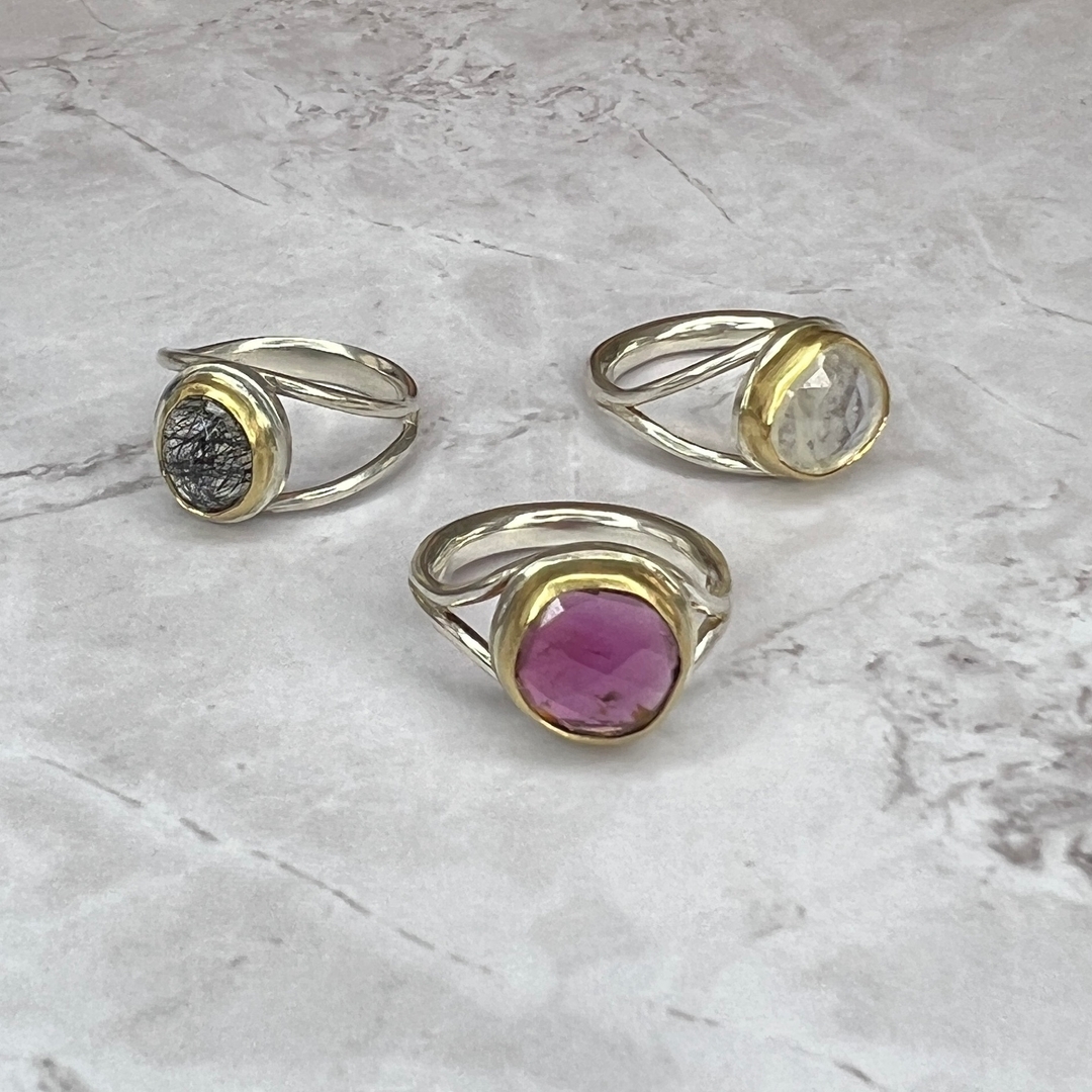 A trio of gemstone rings: Tourmilated Quartz, Pink Tourmaline, and Moonstone set in 18k Gold with sterling silver bands. #amycashjewelry #handmade #marthasvineyard #artisan #jewelry
Sent via @planoly #planoly