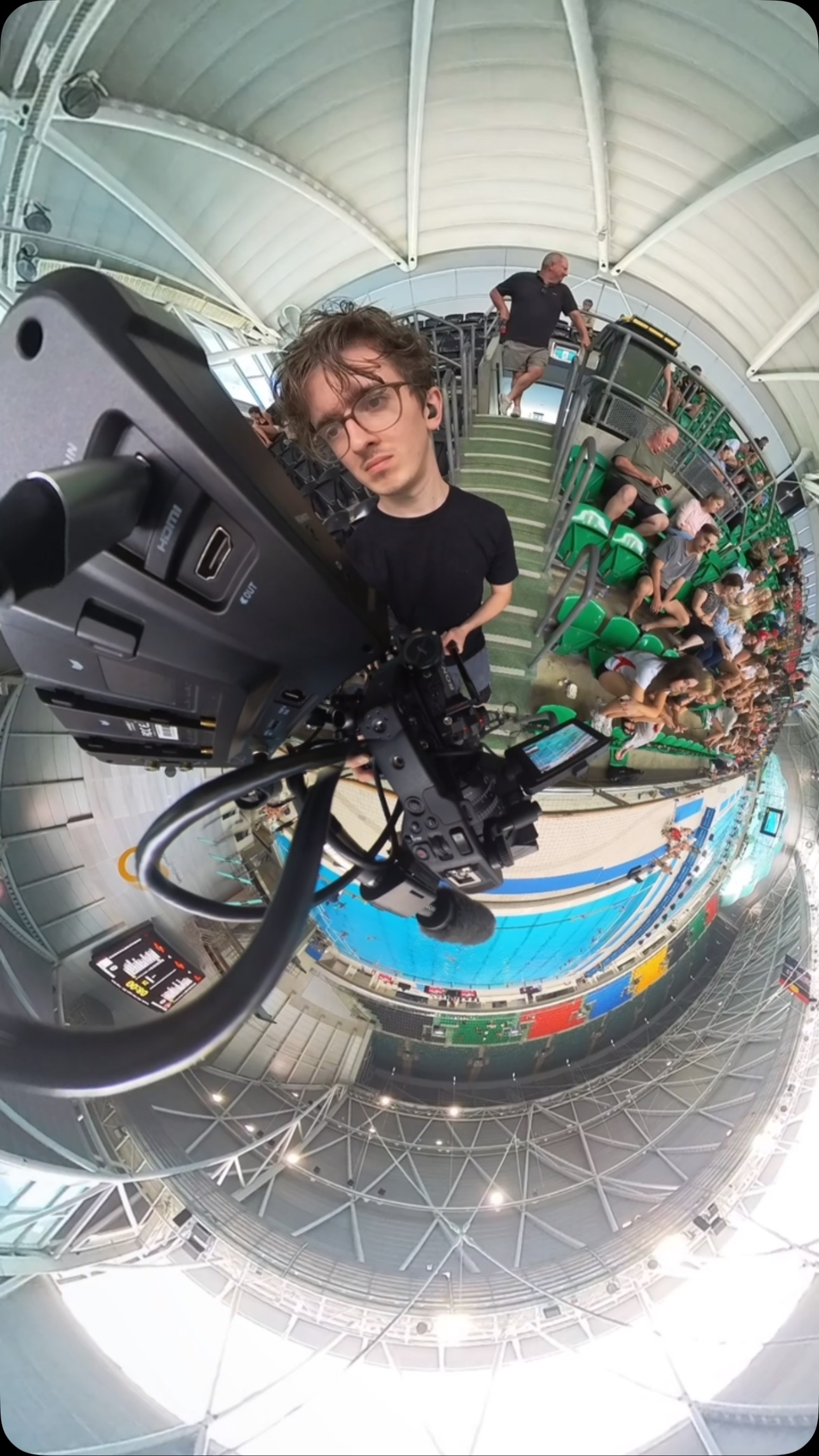 Alright, yes—my head looks like it got stretched in post. That’s the 360cam. But beyond the funny angle, this is the livestream workhorse I rely on. Built around the Sony FX6, this rig is all about flexibility and reliability in high-pressure environments.
With SDI out for a clean, delay-free feed, the Atomos Shinobi 7” helps me monitor exposure and focus in any lighting. The power zoom lens means I can reframe quickly without touching the lens (using my fx6 grip)—crucial when things are moving fast. Mounted on a fluid head, it’s a smooth operator, even when the job demands standing still for hours. Patience isn’t optional in this role—it’s a skill. And this setup lets me stay locked in, dialed, and ready.”
Gear Breakdown:
• Sony FX6
• Atomos Shinobi 7” Monitor
• Sony PZ 28-135mm
• SDI Output
• Manfrotto Fluid Head
• Smallrig quick setup legs
• insta360 Camera (for BTS)
#LivestreamSetup #SonyFX6 #CameraRig #CinematographyGear #SetLife #ProductionRig #VideographerTools #LiveEventFilming #BehindTheScenes #FilmmakerLife