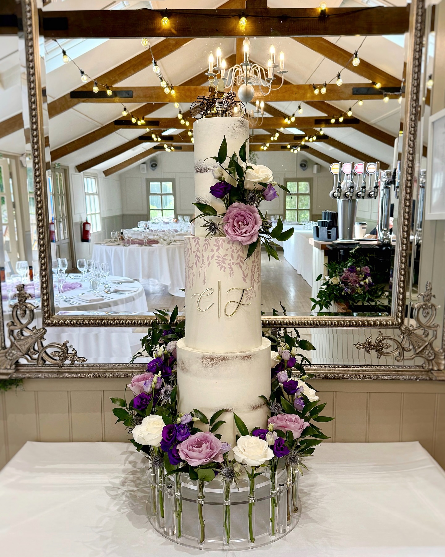 ~ Calvin & Jo… Finally ~
Three tiers, six hours on the road, constructed in a cosy Airbnb kitchen 🤍
This beauty was made for my cousin Calvin and his new wife Jo, all the way up in Newcastle. Baked, levelled and filled at home, stacked and coated in the kitchen of an Airbnb, and finished on-site with fresh florals and personal touches.
Complete with soft lilac stencilling to draw in the colour scheme, and a floral crown of fresh roses, lisianthus, thistles & soft ruscus ✨
#eventstylist #cakedesign #cakedesigner #eventstyling #norwichcakes #weddingcakedesigner #weddingballoons #weddinginspiration #weddingideas #weddingdecor #weddingday #weddinginspo #weddingcake #norfolkwedding #weddingnorfolk #norfolk #weddingcakes #floralcake