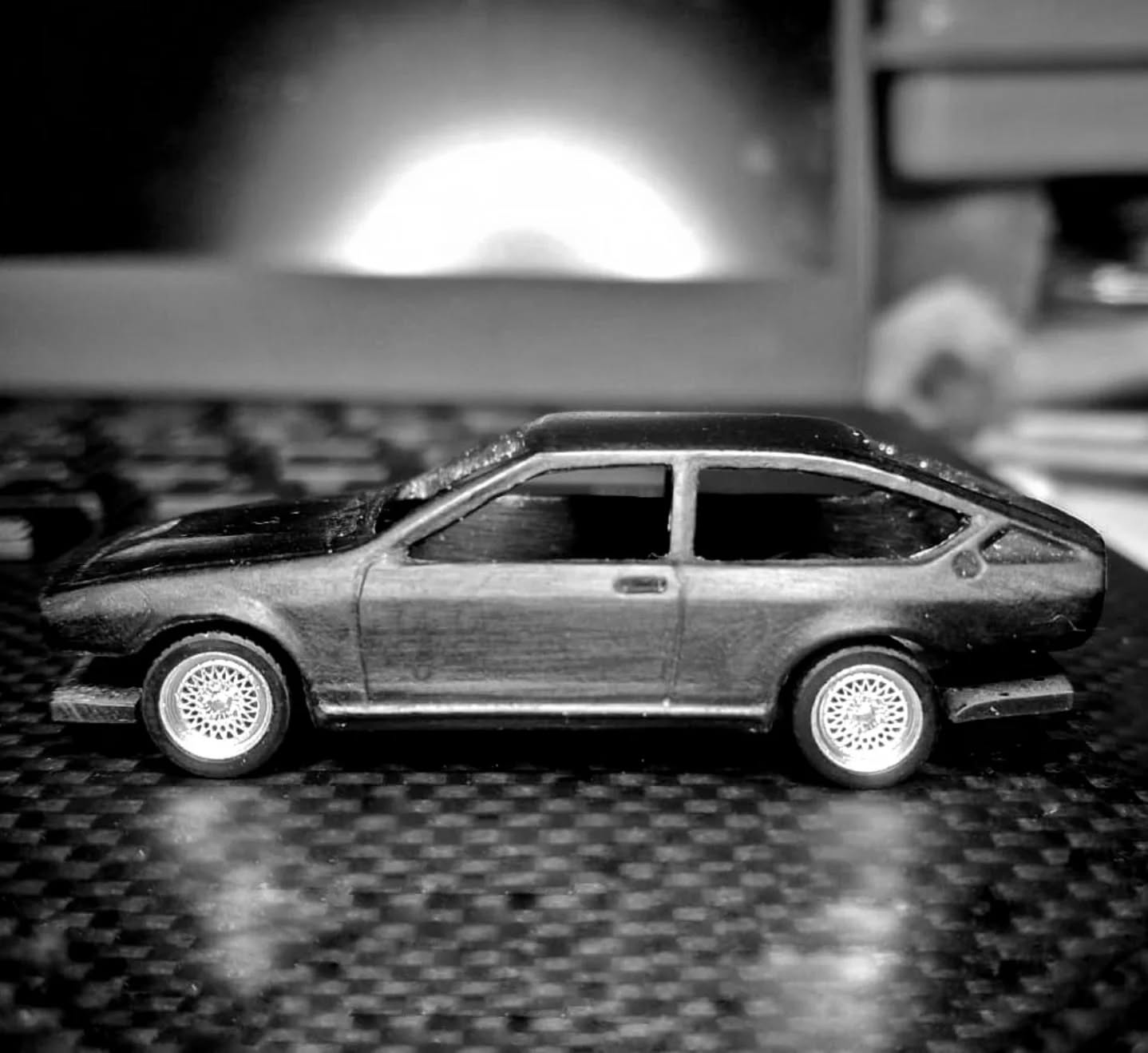 This week we are finalising the ride height, stance and chassis/axle alignments on our first release, code-named P0001. When a full-scale car is reduced in size by 64, every fraction of a millimetre makes a big difference to its appearance.
Our pursuit of accuracy and authenticity makes progress slow, but the end result will be worth it.
Visible in this image are the detailed and accurate wheel design (chrome painted) for P0001, rubber tyres, as well as the silhouette which should give you a strong clue to its identity!
Our site is live at www.ikonikar.com - follow us for updates on South Africa's first homegrown, premium 1/64 scale model brand.
#ikonikar
#164scale
#modelcars
#scalemodel
#diecast
#P0001
#madeinsouthafrica