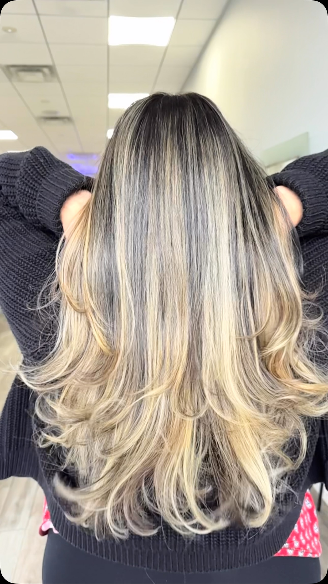 We mixed regular balayage with Scandinavian face framing to blend her gray hair! This will help her last longer without needing to retouch those grays!