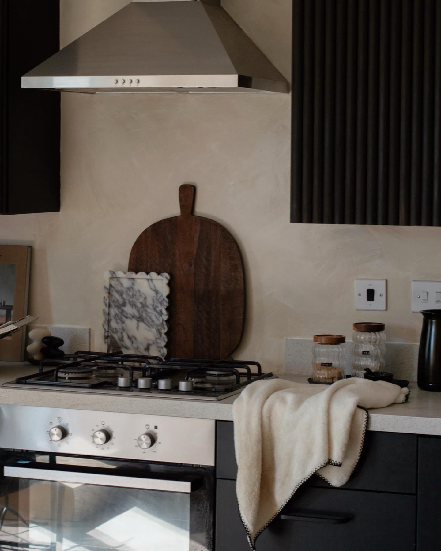 Kitchen & dining room views! 🤎✨
Also, photos 6 & 7 showing off my birthday present @audocph @colinking Interconnect candle holder and I’m in love!!!
Yes, we spent all the days & nights running up to my birthday doing a million house projects so we could spend the rest of the week off the grid and completely switch off. One of these jobs was taking the backsplash off and DIY Limewashing the rest of the space to match the dining room back wall and I love it. We need to go over it one more time but I couldn’t wait and wanted to share 😅
What do you think?
Save For Later ✨
What I used:
-1 x darker paint - I used Cargo @coatpaints
-1 x lighter paint- I used Low Salt @coatpaints
- 60/40 ratio
- A wide paint brush approx. 150mm (lounge/Dining area) & smaller brush for the En-suite
- Add water as you go for easier application and blending
- You can put the two paints into separate trays or place half and half in the same tray. Either is fine, However if you do it like me, you might have to add a little more of the light paint later on, because if you’re not careful they can get over blended in the same tray.
I tried the cloud style application, painting ‘Xs’ and reapplying until fully blended🤍
- You can keep adding white and re-blending if you want to make your Limewash effect brighter
- 1 x paint application only, which was good news for my wrist 😅😅
Have a wonderful week! We’re off on a little trip with the Doggo now for a few days! 🐶
Love,
Nicola & Vicki xx
#warmminimalism #japandistyle #minimaldecor #japandiinterior #scandihome #interiorblog #interiorideas #wabisabi #slowliving #parisianstyle #kitchendesign #interiorandhome #softminimalism #nordichome #nordicminimalism #kitchendesignideas #minimalisthomedecor #neutraldecor #interior4all #interior4you #parisiandecor #aesthetic #diningroomdesign #diningtable #diningroomdecor #boucle #limewash #diylimewash #marbletable