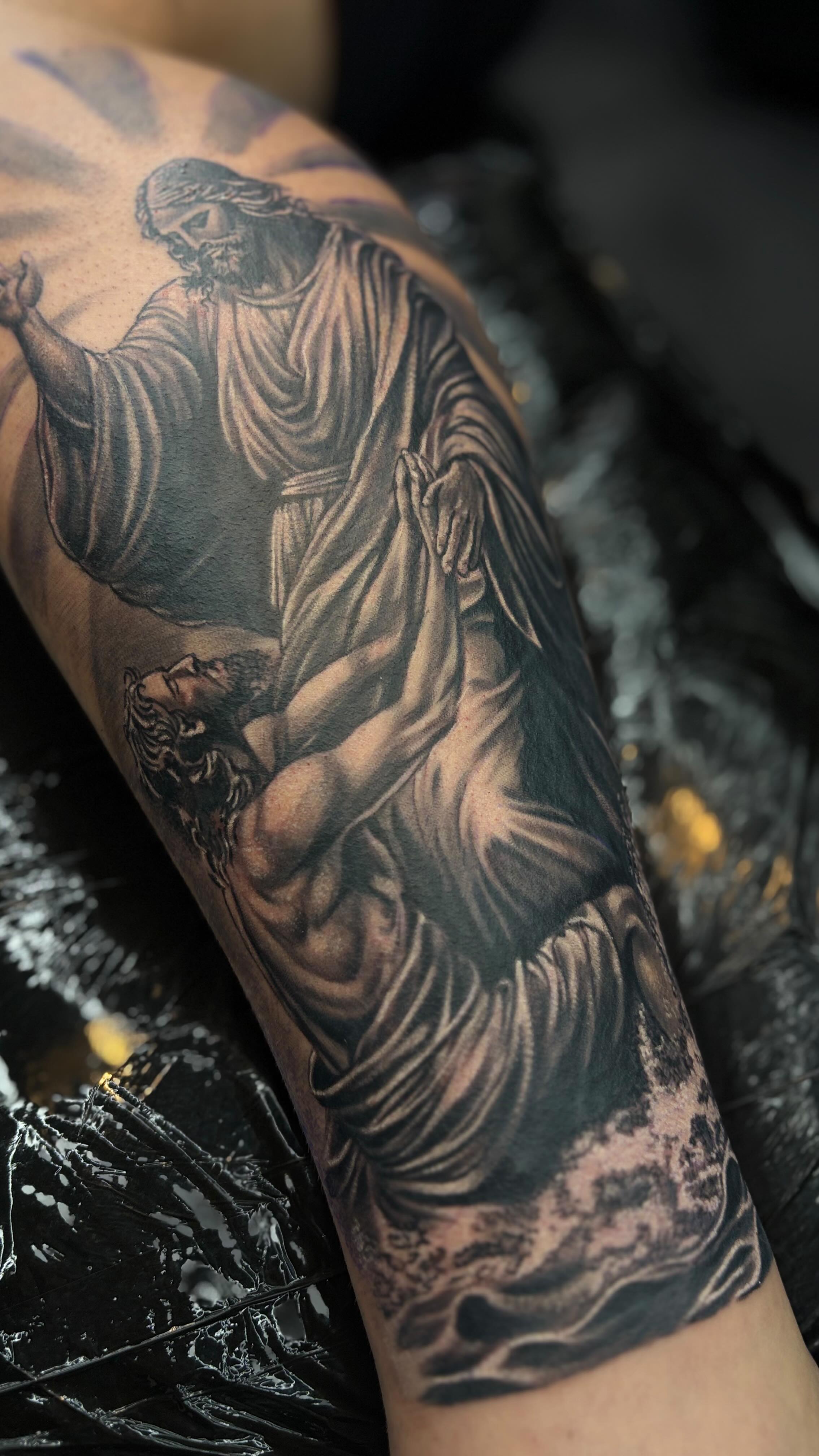 The scene of Jesus saving Peter from sinking symbolizes faith, divine intervention, and the power of trust in times of fear. As Peter struggles in the stormy waters, Jesus reaches out to him, offering both physical and spiritual salvation. This moment highlights the transformative power of faith and the unwavering presence of grace, even in the most turbulent of circumstances.
✉️ DM to book your free consultation
.
.
.
.
.
#tattooculture #tattoocolor #tattooedlife #tattooinstagram #tattooedpeople #tattooofinstagram #tattoofineline #tattoostagram #tattoodrawing #tattoosupply #lovetattoos #tattoosupplies #tattooinked #menwithtattoos #inspirationtattoo #tattooers #tattooman #tattooinkspiration #tattoocollector #tattoosforwomen #tattoomen #simpletattoo #tattoomaster #womenwithtattoos #tattoorealism #tattoosformen #tattoowoman #delicatetattoo #tattoosocial #kwadron