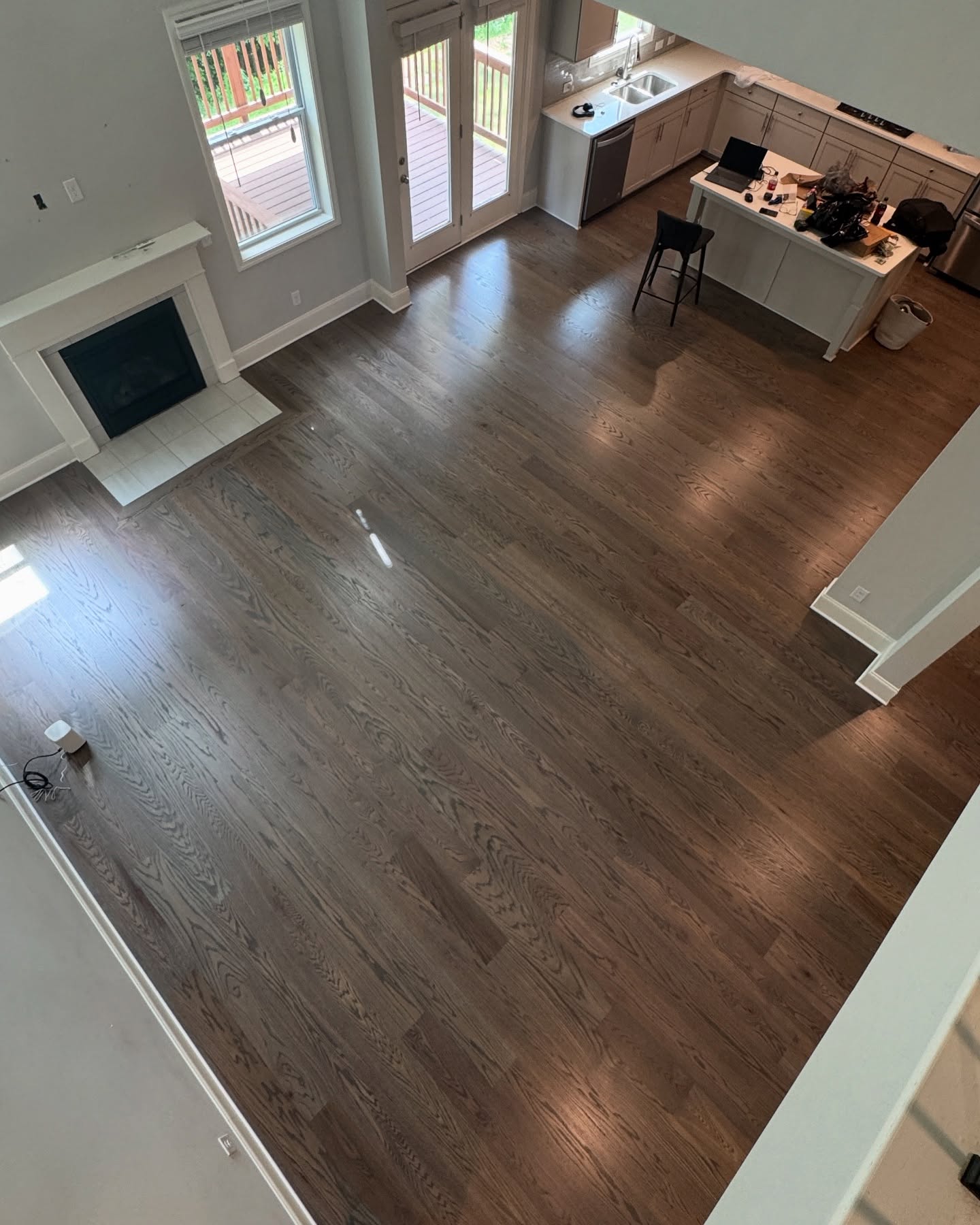 3000 ft.² of 7 inch character grade red oak installed and finished with warm gray stain and our upgraded oil base polyurethane with a matte sheen. What an incredible project to finish up with a super happy customer.