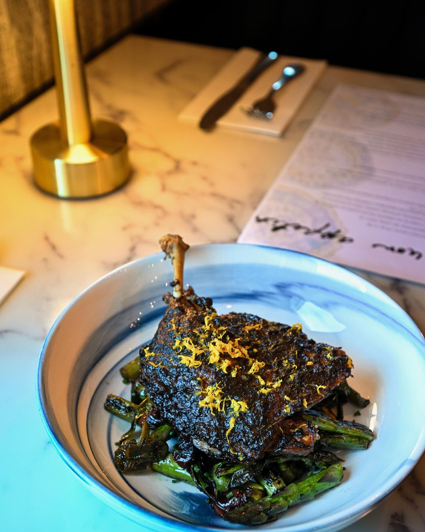 You can find this item on our seasonal menu âď¸
Duck Leg
black garlic agrodolce | asparagus | green onion | pickled cherry | chive