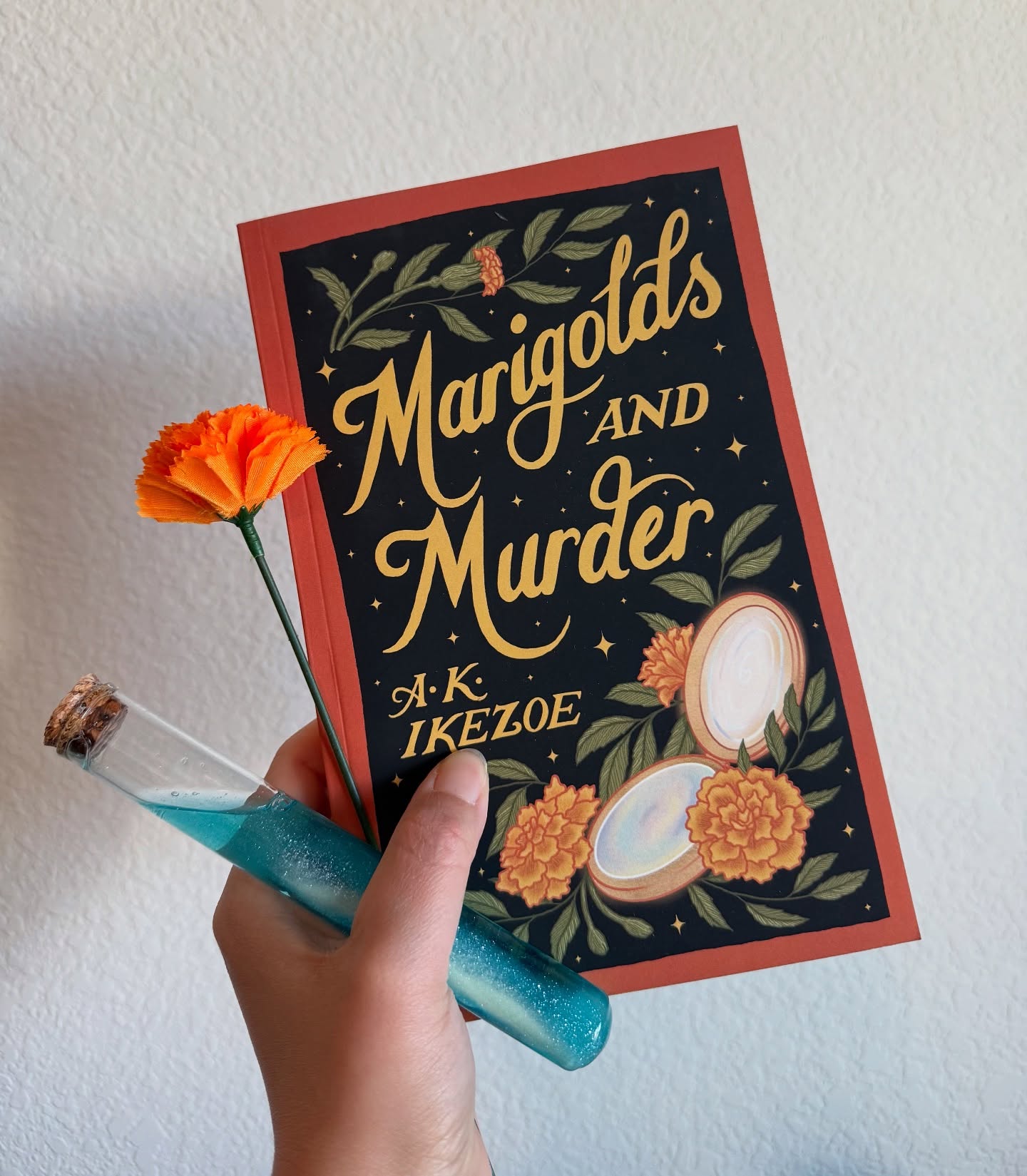 I’m so excited to have received an ARC of AK Ikezoe’s upcoming debut novel, Marigolds and Murder! This PR box is packed full of goodies, all inspired by this queer fantasy mystery set in 1950’s Philadelphia.
If you like the sound of:
✨ Murder mystery
✨ Historical fantasy
✨ Private investigators
✨ Sapphic characters
✨ Asian American FMC
then you should consider ordering a copy when the book releases, on June 3rd, 2025!
I’ll be digging into this book when I go on a short vacation next weekend, and I’m really looking forward to it!
#indieauthor #bookrecs #authorsofig #booksbooksbooks #historicalfantasy #murdermystery
