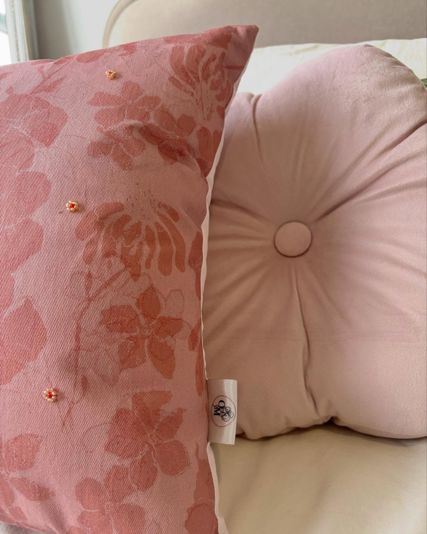 British Blooms - dusky pink cushion made using organic cotton, hand drawn print with glass beading details. This cushion will be available on my website soon. #sustainablymade #handdesign #handmade #sustainability #interior #interiordesign #textiledesign #smallbusiness #floral #beading #textiles #uniquedesigns #pastel #organiccottonfabric