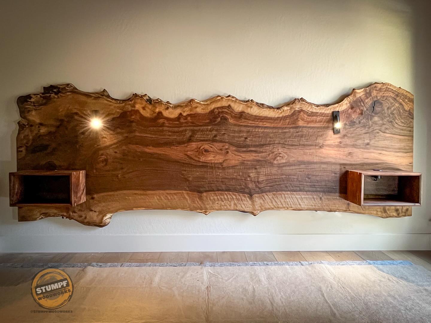 Claro Walnut Headboard & Floating Nightstands
Rich, warm tones and stunning grain patterns are the hallmarks of claro walnut. This piece is bursting with elegance for this demure Tahoe bedroom. I added integrated floating nightstands for nighttime essentials – each with low profile power for any device. Solid Wood Construction means it’s heavy and here to stay for generations.
I can’t tell you how enjoyable it was crafting these elements that make up the piece. Splicing the tiny Beechwood into the nightstand joints to ensure stability. Finding the perfect LED nightlights to accompany the aesthetic.
Simply starting with a 400 pound 16 foot slab of wood and paring it down to its final shape was a thrill…Still is when I reflect on these photos. I hope you all enjoy!
…
DM me if you’re interested in a piece similar to this beautiful treasure.
#StumpfWoodworks #MakeGaragesDirtyAgain #TreeToTable #Lacquer4ever #LiveEdge #Urbanwood #HandcraftedFurniture #SustainableFurniture #NevadaArt #LiveEdgeFurniture #RusticModern #Woodworking #Handmade #RenoMade #MountainModern #MadeInReno #BespokeFurniture
Sustainably harvested fine furniture for the beautiful Lake Tahoe basin