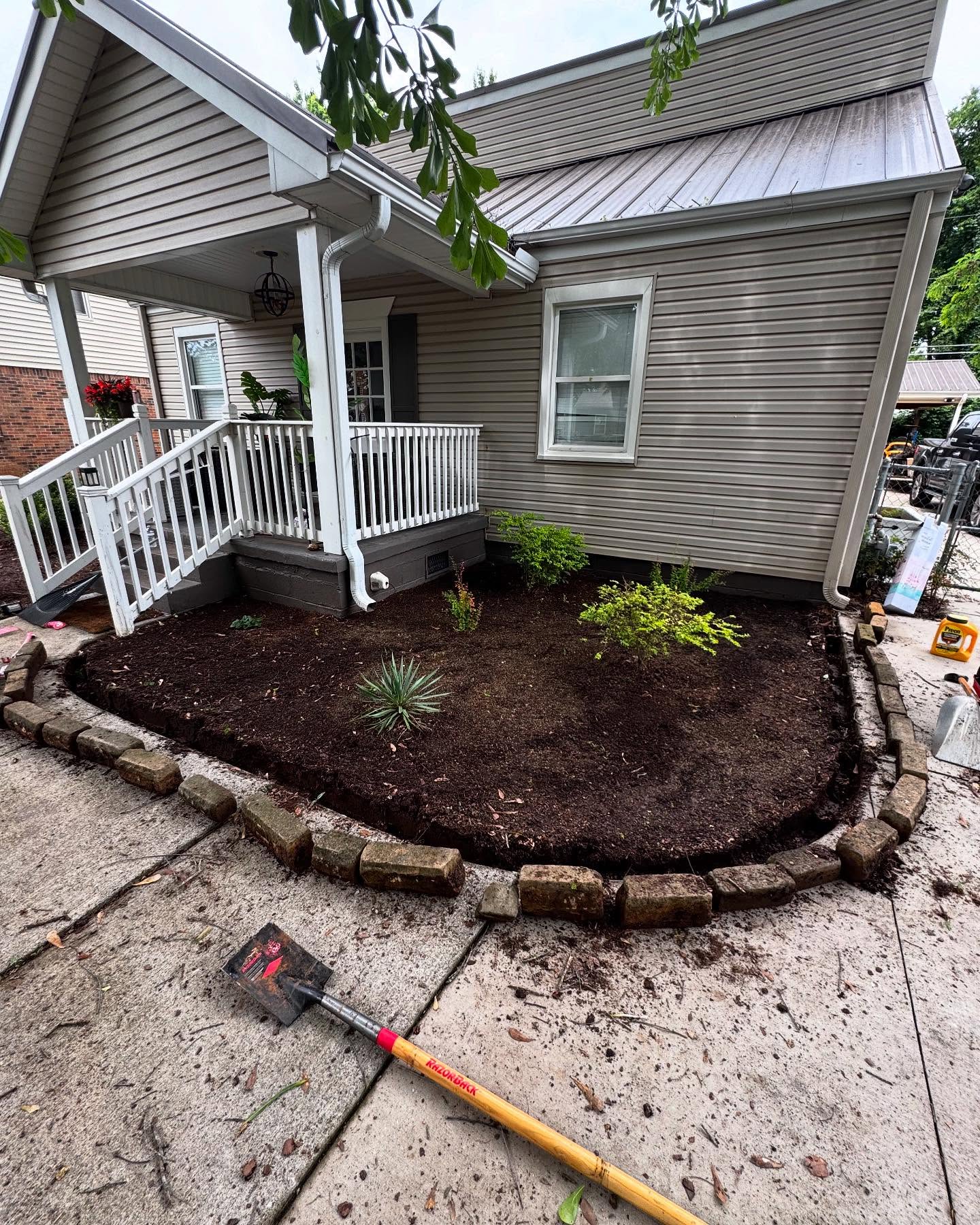 Before and after - mulch application + plant planning.