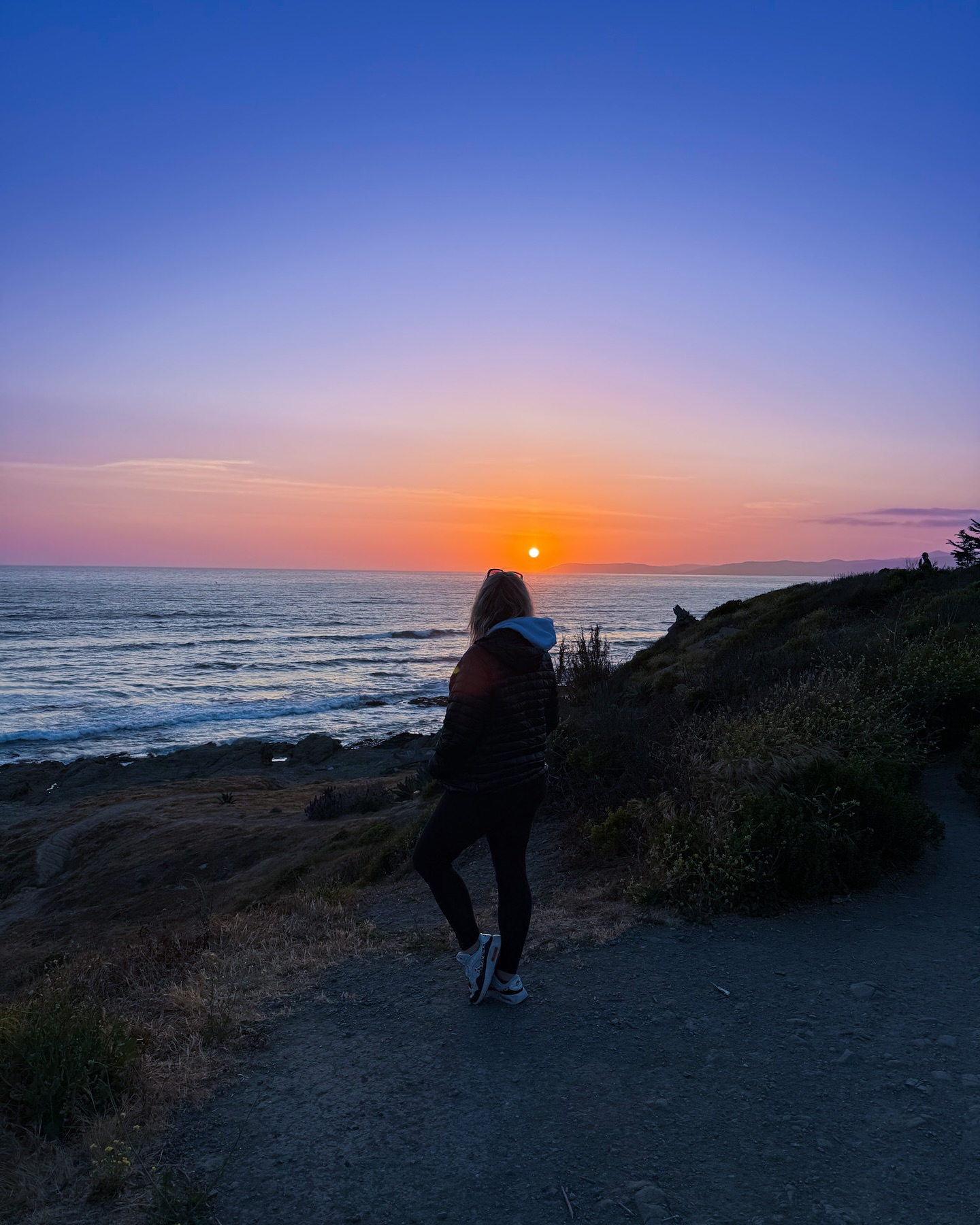 Flew in from Mexico to visit my daughter in Morro Bay.
She’s growing a human.
I’m growing into Mimi—with coffee in one hand and an edible quietly setting in during aisle 7.
Not the swaddle-and-scrapbook kind.
I’m the “sage the stroller or stash mezcal in it?” kind.
I walk the beach alone in the mornings—layered up, looking a little unbothered, a little undone.
Hair wild. Air crisp.
No birth plans, no small talk. Just salt and space to feel it all.
Caught my reflection in a shop window—sand on my shoes, something soft in my face.
Not lost.
Just becoming.
This version of me?
She’s layered, honest, and right on time.
#BarefootMimiEnergy
#MexicoToMorroBay
#CoffeeAndEdibles
#SageTheStroller
#BecomingInBareFeet
#ThisIsTheThreshold
#NoManualJustMagic
#softisthenewstrong