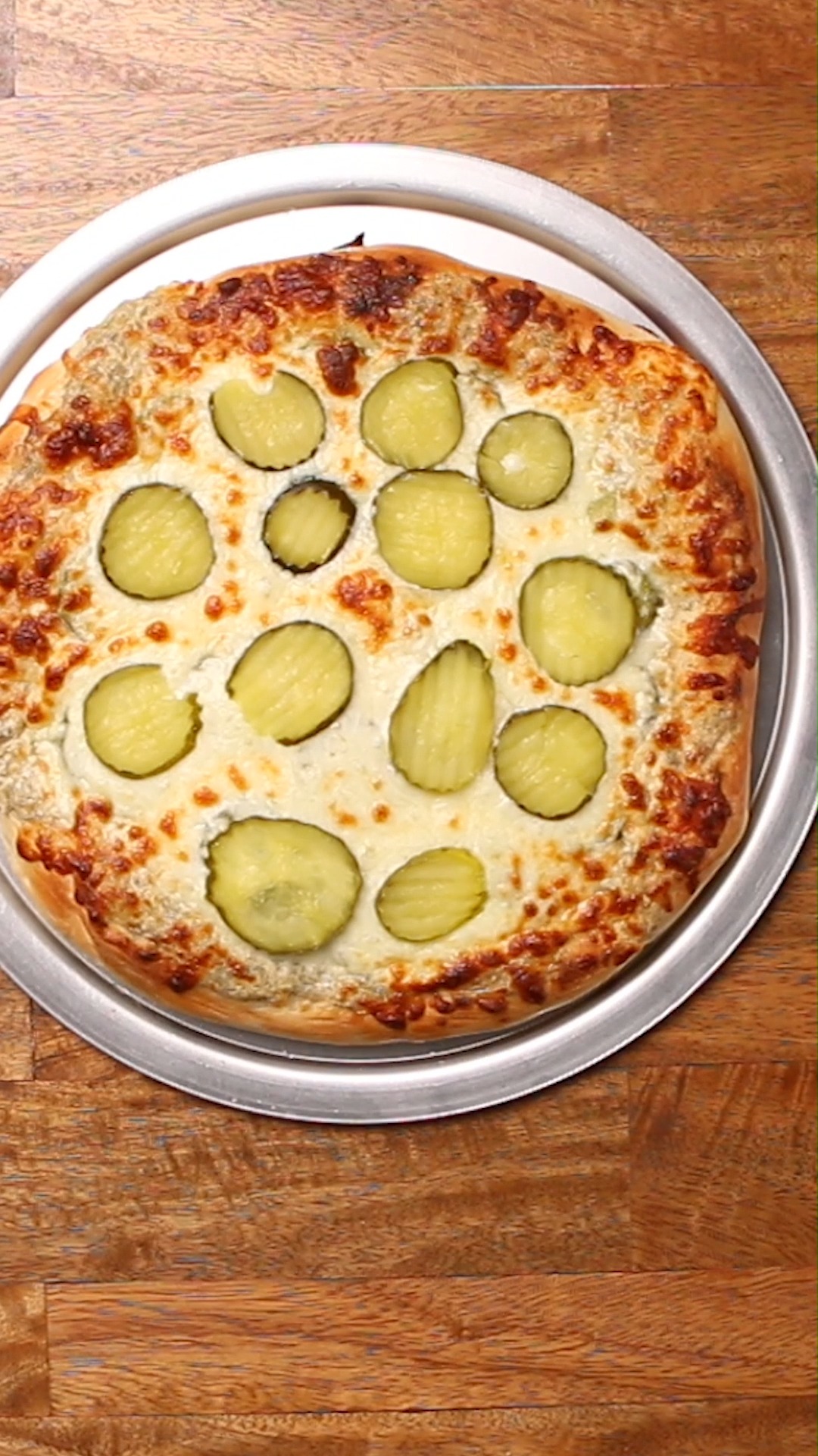Pickle lovers, your pizza is here...and it's kind of a big dill. A creamy garlic-dill white sauce sets the stage for layers of tangy pickles, melty cheese, and bold briny flavor in every bite. Trust us -- it's not weird, it's wonderful.
#pickles #pizza #recipes #pizzanight #tiseos #tasty #cheesy #pizzalover #tiseosdough