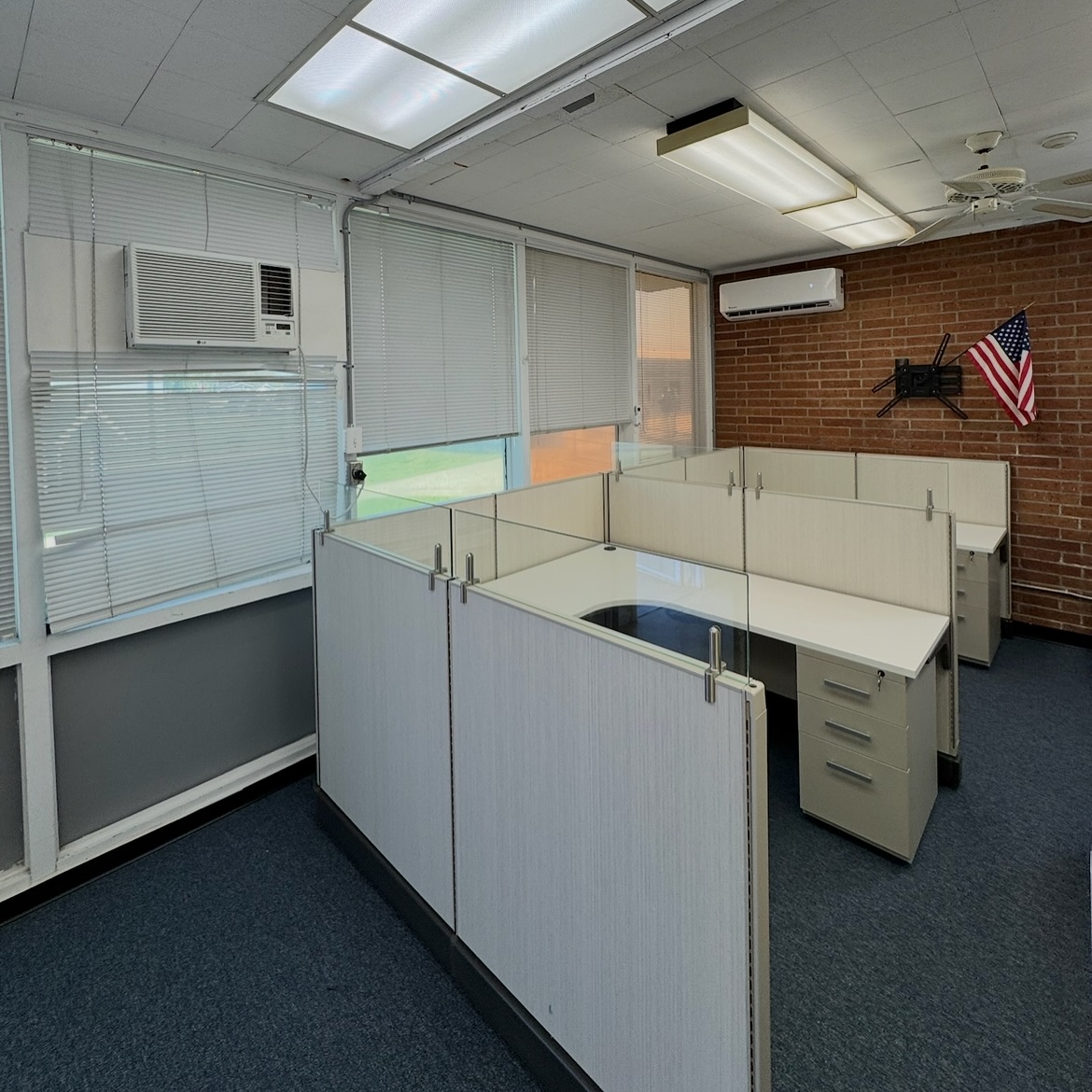 Bright, open, and ready for impact 🔆 We installed sleek new workstations with frameless glass at Highlands Community Charter School!