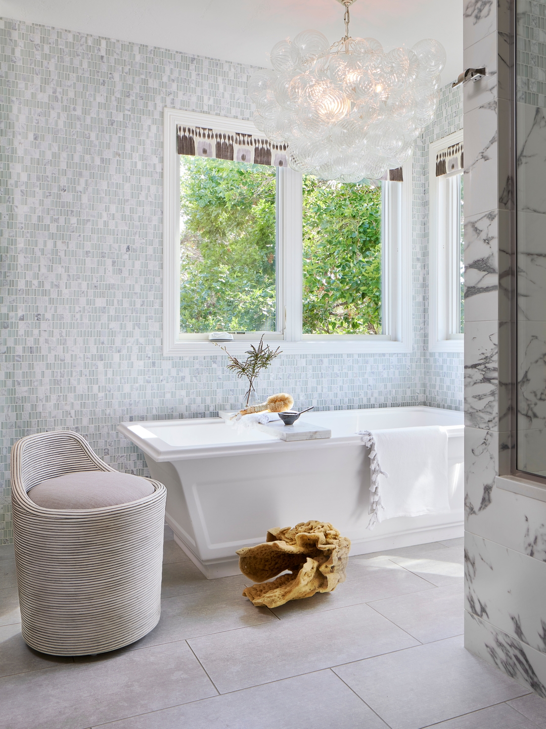 Effortless elegance, designed to be lived in ✨
From the marble shower and statement chandelier to the cozy chair tucked beside the soaking tub, this bath strikes the perfect balance between glamour and comfort.
It’s a space that feels elevated without ever feeling untouchable — a true retreat, ready for quiet moments and daily rituals alike.
Call us at 303.953.1909 to start designing a sanctuary that feels like you. 🤍