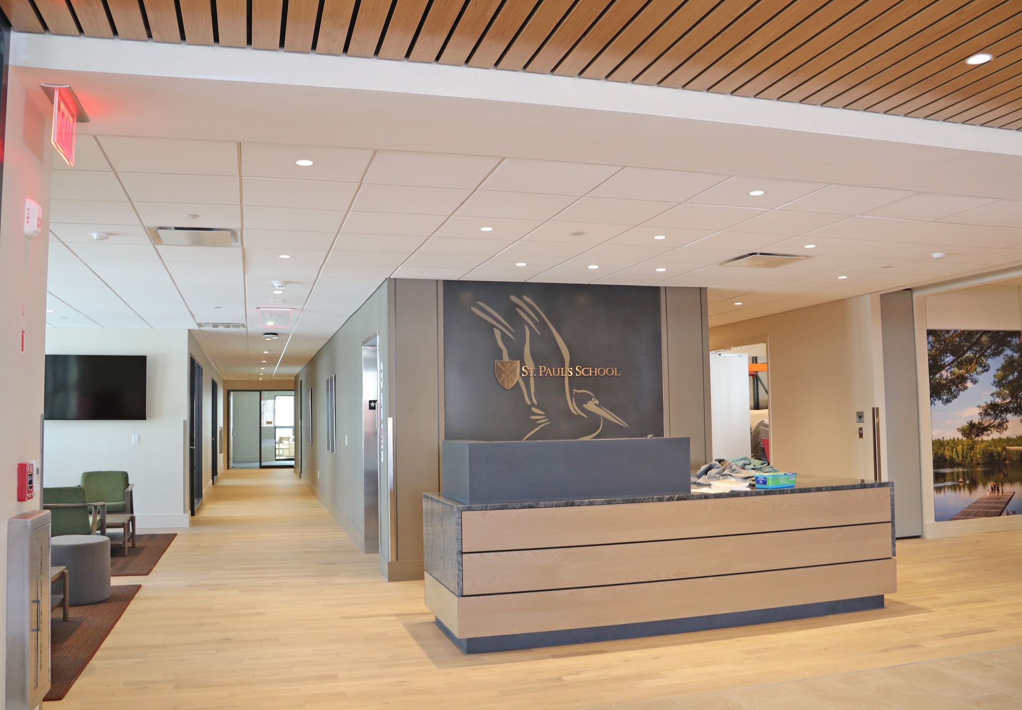 Our acoustical team teamed up with @harvey_construction to bring standout finishes to St. Paul’s newest alumni building.
The space includes standard ACT, Armstrong woodworks planks, USG Planx Perforated Linear Metal ceilings and Stretch FabricWall. These products span across the spacious lobby and exterior entrance.
These high-performance materials can be seen throughout the expansive lobby and continue through the exterior entrance, blending aesthetics with acoustic functionality to elevate the experience for all who enter.
Another successful collaboration, built on precision and quality craftsmanship. Shoutout to our amazing team for their hard work on this project!