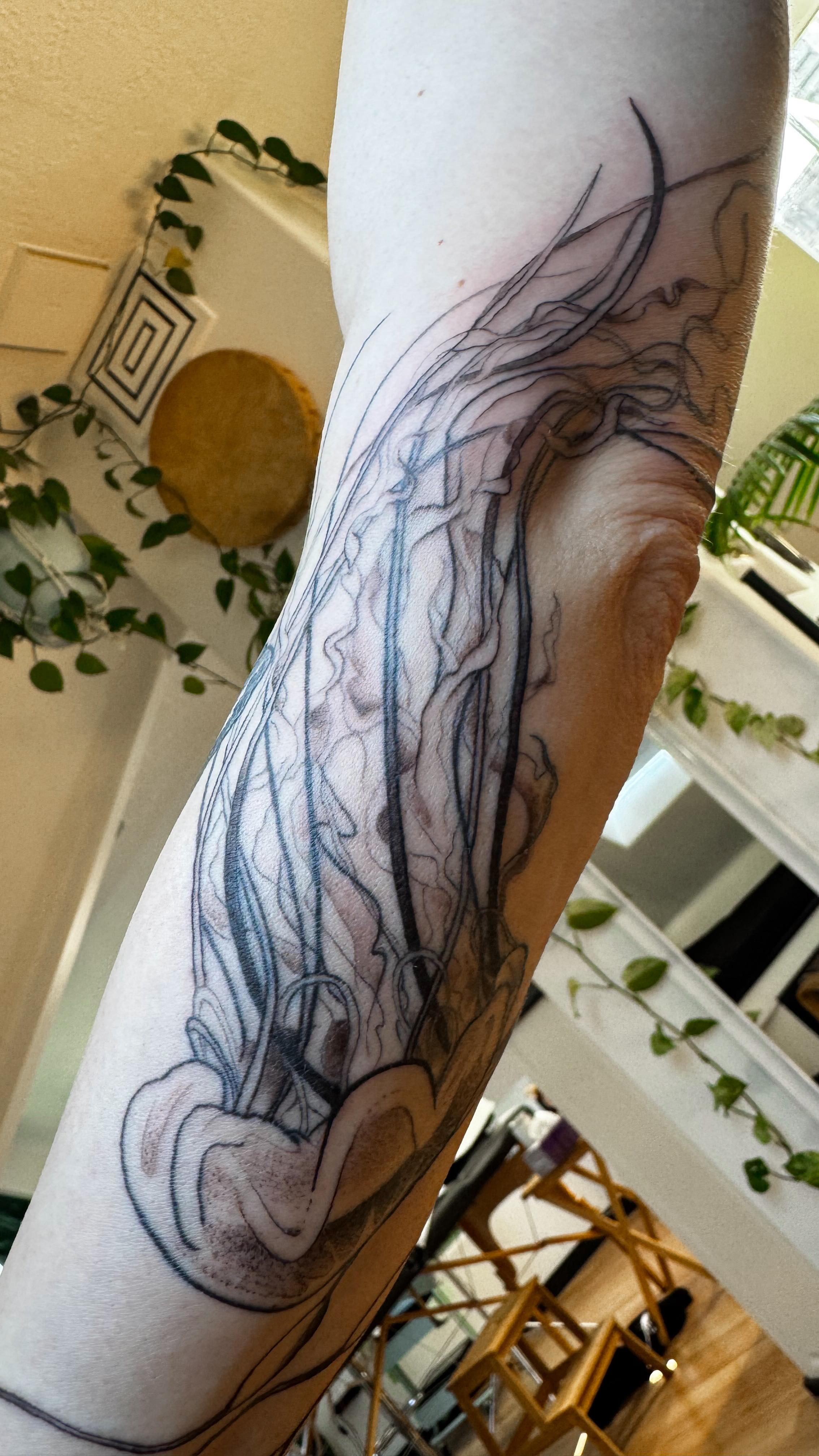 Another beautiful day in the beautyscape of creativity & play. This darling came in for a visionary somatic quest, exploring the inner realms, revealing what truth was ready to be embodied.
We cultivated medicine to nourish and welcomed the ancient guardians to rise up from the depths ~ yum, I really love the slow & intentional way of weaving intent and how curiously the wisdom meets us in devotional presence.
May you embrace the love today 🩵
#whaletattoo #humpbackwhale #whalemedicine #jellyfishtattoo #intentionaltattoo #wisdomkeeper #vancouvertattoo #oceanart #pnwartist