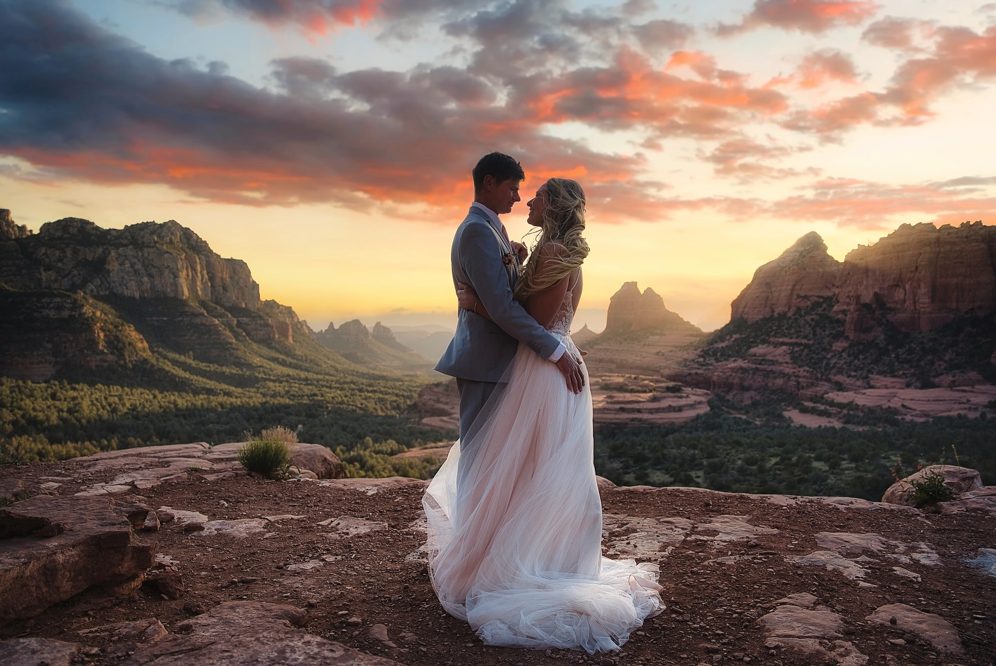 I’ve photographed hundreds of couples who have traveled from all around the world to experience a sunset from this epic location called Merry Go Round. I’ve asked several of them was it worth the trip? They told me it was even better than they could have imagined and that it was one of the most spectacular places they have ever seen.
I would have to agree! I never get tired of seeing it.
#visitsedona #sedona #sedonaarizona #sedonaphotographer #sedonaweddings #sedonaweddingphotographer #sedonaelopementphotographer #sedonaelopement #sedonacouplesphotographer #sedonaengagementphotographer #sedonaengagement #arizonaweddingphotographers #arizonaelopementphotographer #sedonaadventurewedding #sedonaadventureelopement #adventureelopement #adventureelopementphotographer #sedonafamilyphotographer #sedonaweddingvenue