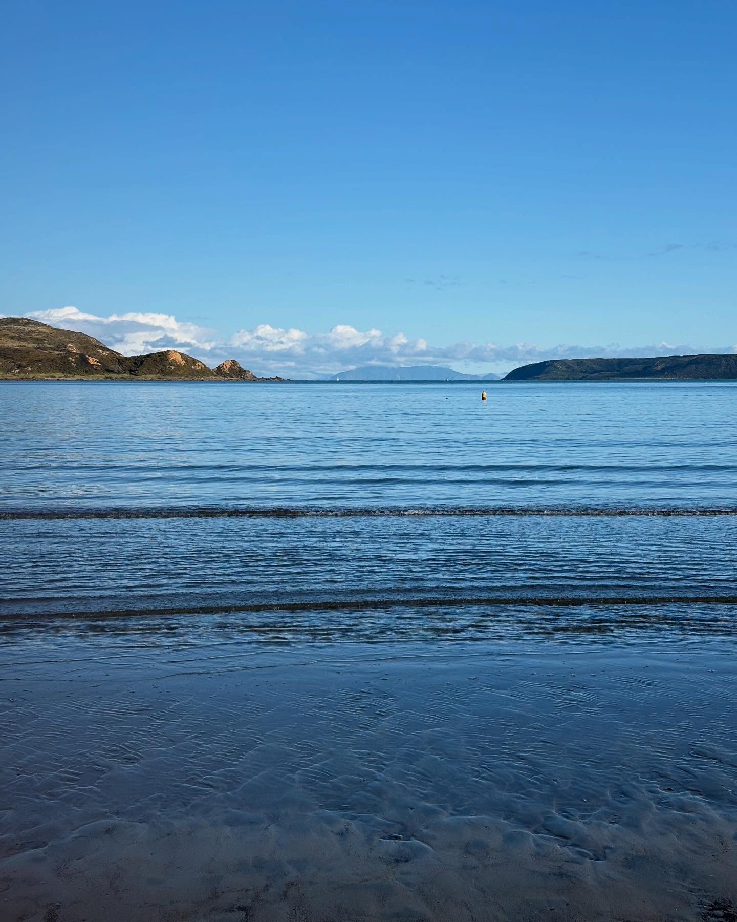 A stunning, calm winter’s day in Plimmerton. Mana Island’s on the right and there’s the slightest glimpse of the South Island in the distance.
Plimmerton became a popular seaside resort in 1885, when regular train services began from Wellington