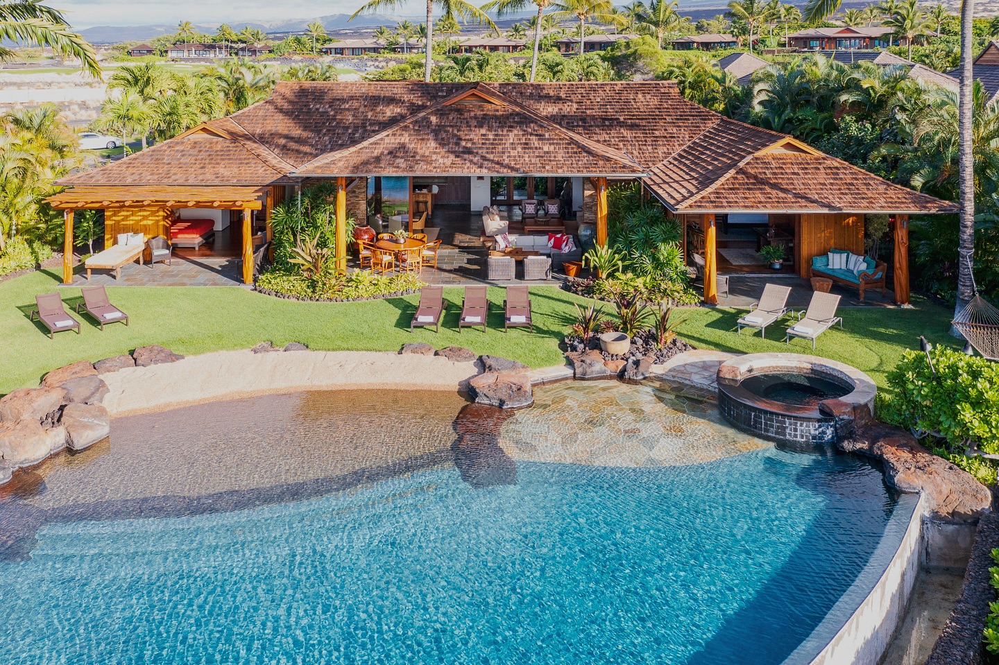 We just keep adding value to your stay.
* Complimentary airport transfers
* Flexible check-in/out times
* Golf carts for your use
* Sink into comfy pillows atop luxe beds with premium linens.
* Pre-order your groceries, and weâll have them delivered and neatly tucked away in your fridge
* A wellness gift to melt travelâs stresses
* A locally sourced coffee and tea station
* Indulge in Hawaiian bath amenities
* Rely on our Master Concierge for kid gear, private chefs and any other needs
* Complimentary maid service every two days
Every detail is designed to streamline your experience, leaving you free to unwind and enjoy. Learn more at KemaKama.com
Featured home: Stunning Kaimupulehu Grand Estate