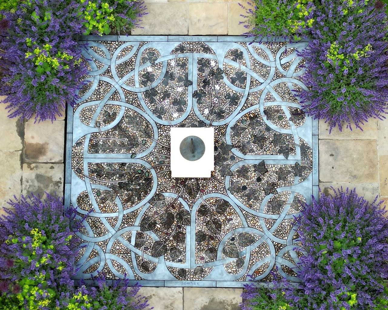 Happy Summer Solstice🌞 A new season is officially upon us. Here are some nice summertime images of my recently completed private comission of a celtic themed four seasons mosaic. Its always so rewarding to look back at the original concept drawings and compare them to the final product. I am quite pleased with this one, and delighted to have been able to work with glass artist Adrienne Diamond to create the fruit and flower details. #pebblemosaics #mosaicsbysunnywieler #fourseasons