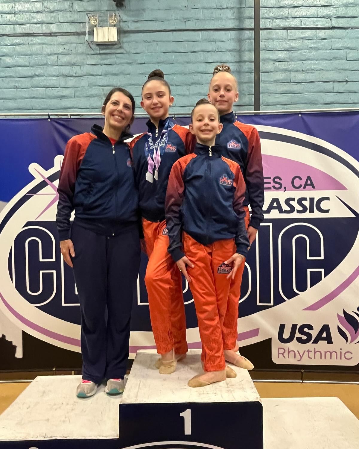 DVP Classic 💫
by @usagymrg and @rhythmicacademyla
Our incredible Level 7s — Giulia, Maggie, and Nina — wrapped up their season with so much to be proud of!
These three DVP gymnasts lit up the floor in Los Angeles, showcasing their dedication, artistry, and growth through their routines this past weekend. 💪✨
We, as coaches, are beyond proud of everything you accomplished this season — and even more proud of how far you’ve come. Your hard work truly paid off, and you should be proud too.
🌟 Special shoutout to Giulia, who finished among the Top 12 gymnasts in floor and ball, bringing home two medals:
🥉 6th Place – Floor
🥉 10th Place – Ball
This marks an exciting new chapter — all three gymnasts are now FIG-ready, and we couldn’t be more thrilled to welcome them to our FIG Junior Team.
Congratulations HOPE coaches!
Thank you @usagymrg for this opportunity. Thank you all judges and @rhythmicacademyla for all your effort and hard work through the weekend. Thank you for having us.