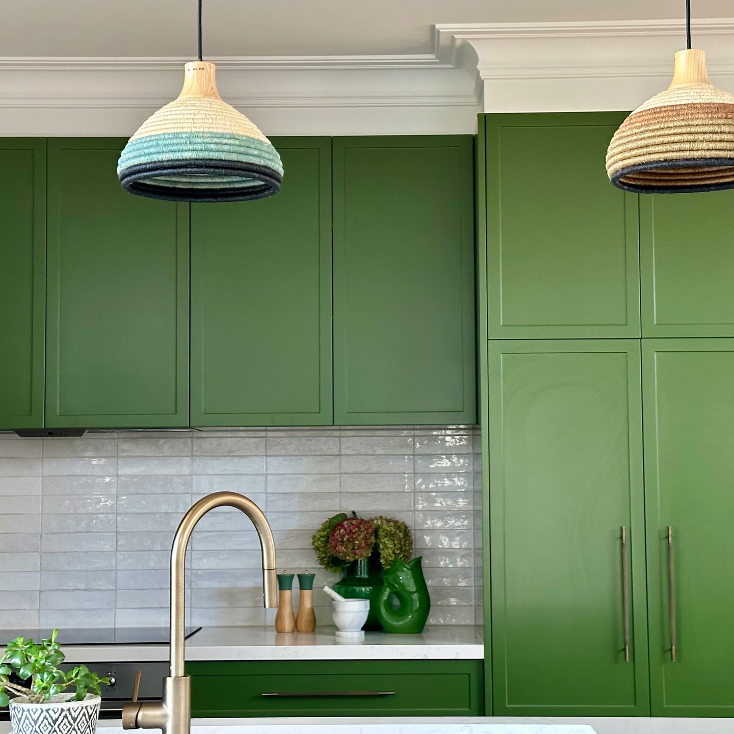 Green in the kitchen? Yes please. Colour psychology tells us that green is the colour of balance, calm, and renewal. It is a comforting colour that pairs well with other earthy colours like terracotta, camels and tans and brings the serenity of nature indoors, making your kitchen feel fresh, clean and inviting. If green cabinets are a step too far (though how pretty are these ones in my clients beautiful kitchen in colour Nereus by Dulux) you could consider bringing in a few accents with accessories like olive tiles or even just a quick update with some plates or tea towels.
Green is known to reduce stress and boost focus. So whether you’re chopping onions or tackling your tenth cup of tea for the day, this calming colour keeps the mood grounded and the space feeling harmonious. Green pairs beautifully with natural materials like wood, stone, and brass—adding layers of warmth and sophistication.
Want more colour confidence and styling inspiration?
Sign up to my website for my blog post updates which offer easy, uplifting design tips you can actually use.#sydneydesigner
#northshoredecorator
#interiordesignernorthbridge #kitchendesignsydney
#styling
#havefunwithcolour
#colourcrush
#interiordesignsydney
#homedecorating