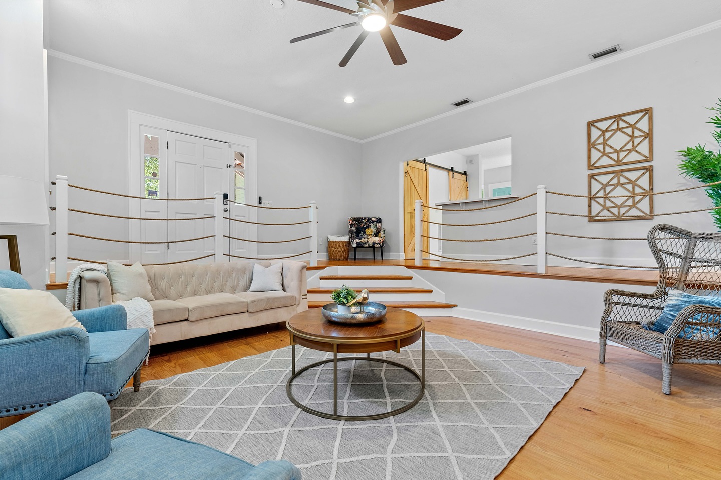 We ❤️ a quirky home feature and this living room at 4227 Woodmere St brings all the entertaining vibes!