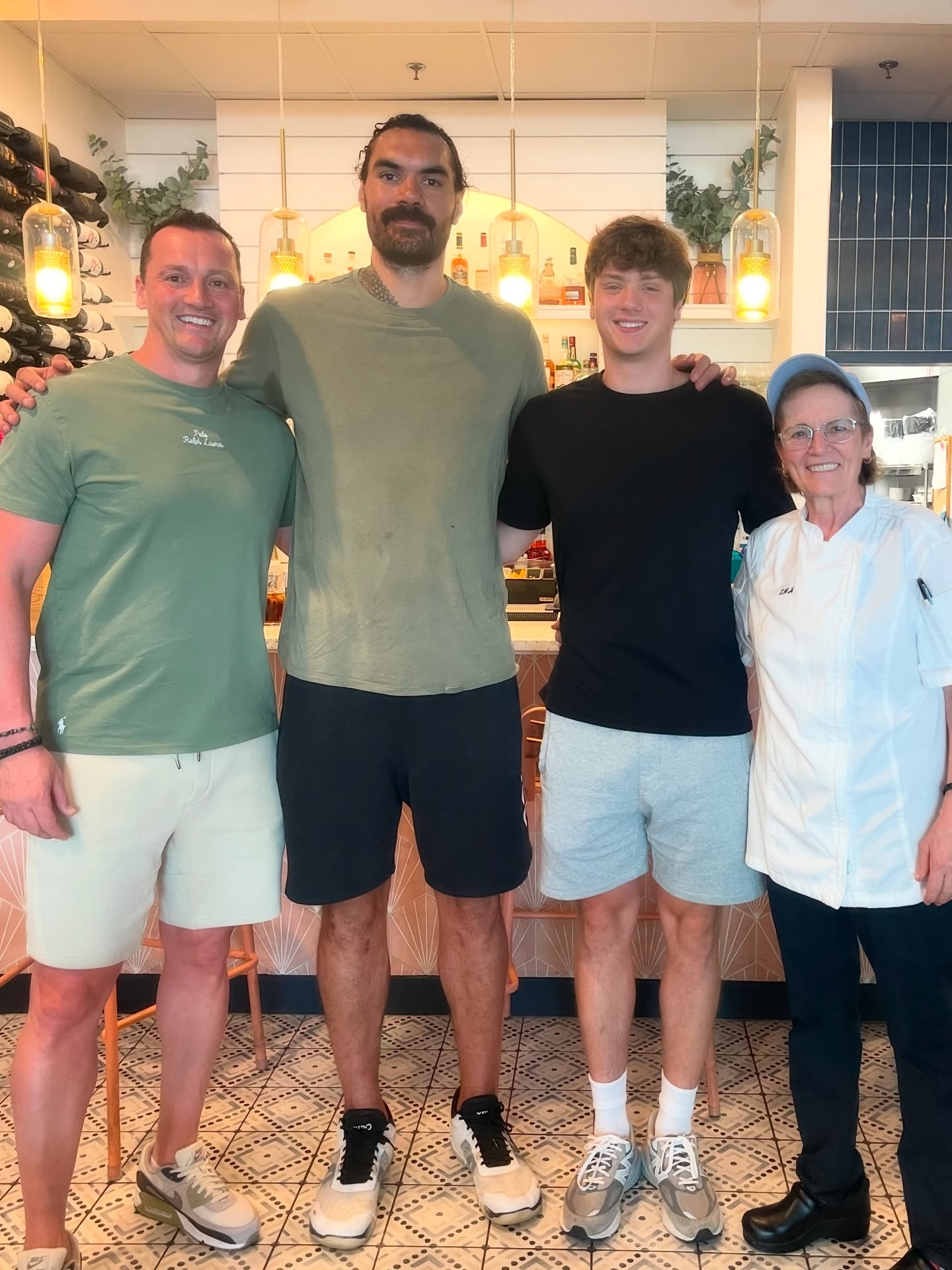 The strongest man in the @NBA eats Greek! Steven Adams of the Houston Rockets walked in today and was kind enough to take a picture with Mom and Phil! He used to play for the Thunder for so many years, so we’re assuming he’s rooting for OKC in Game 7 of the NBA Finals tonight! Who you got? 🏀💪🏆 #stevenadams #nba