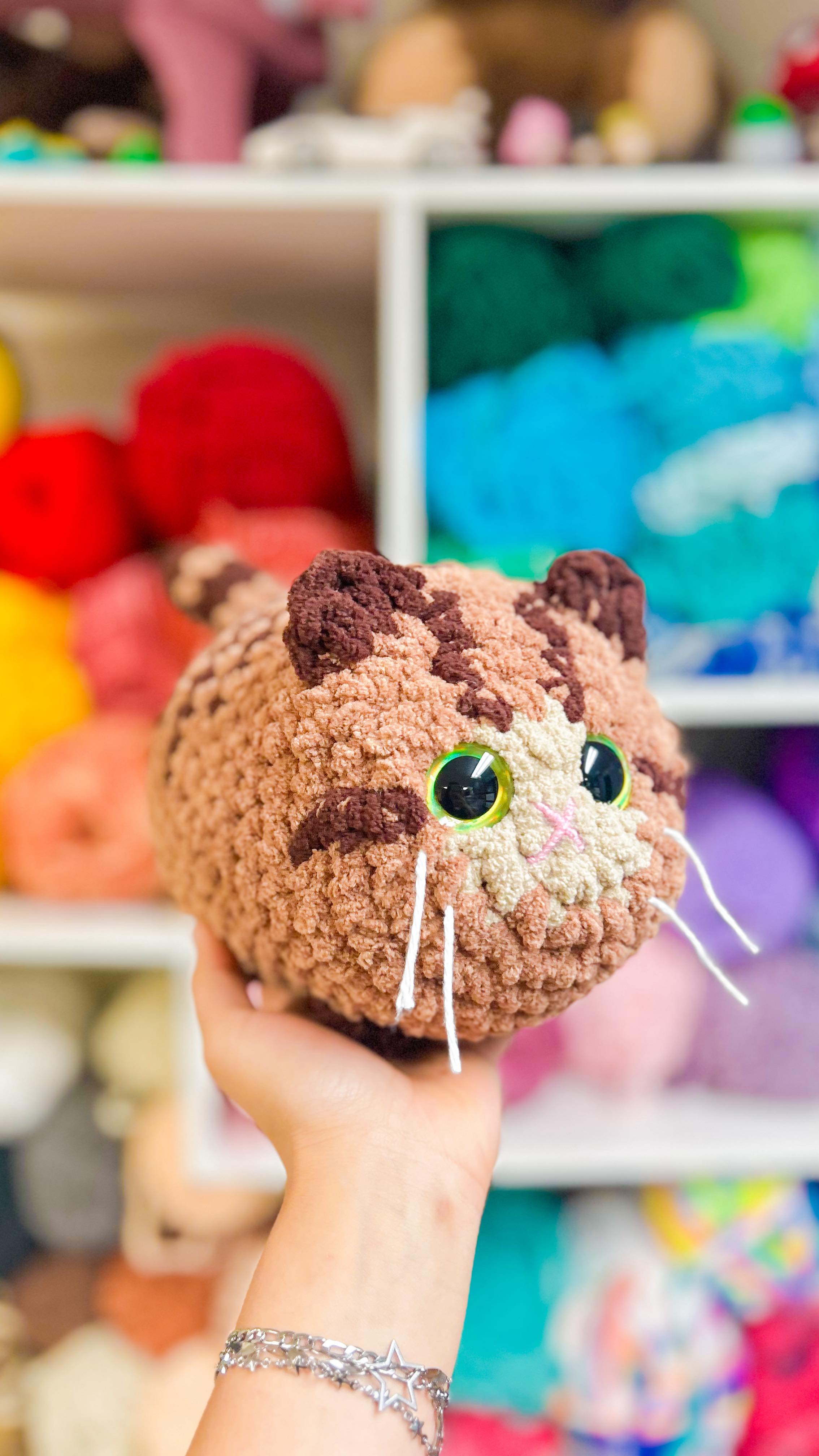 Still gotta add the little stripes next—but I’m already obsessed with how this loaf cat is turning out! 🐾💛
The first one was super cute too, but I accidentally used the wrong color 😅 so I’ll probably just add him to my market table. This second try is already looking so much closer to the real thing!
COMMENT and tell me—did I accidentally crochet your cat?? 👀✨💭
Pattern: @anniecarrawayart
#crochet #amigurumi #yarnfusion #handmadebusiness #crochetplushies #plushies